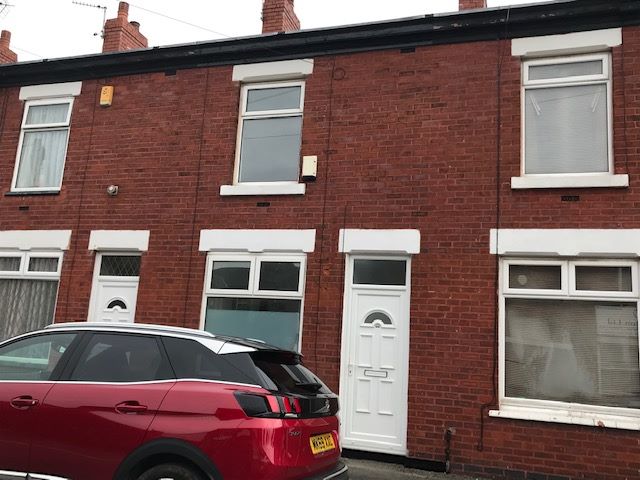 2 bedroom mid terraced house Let in Stockport - Photograph 1.