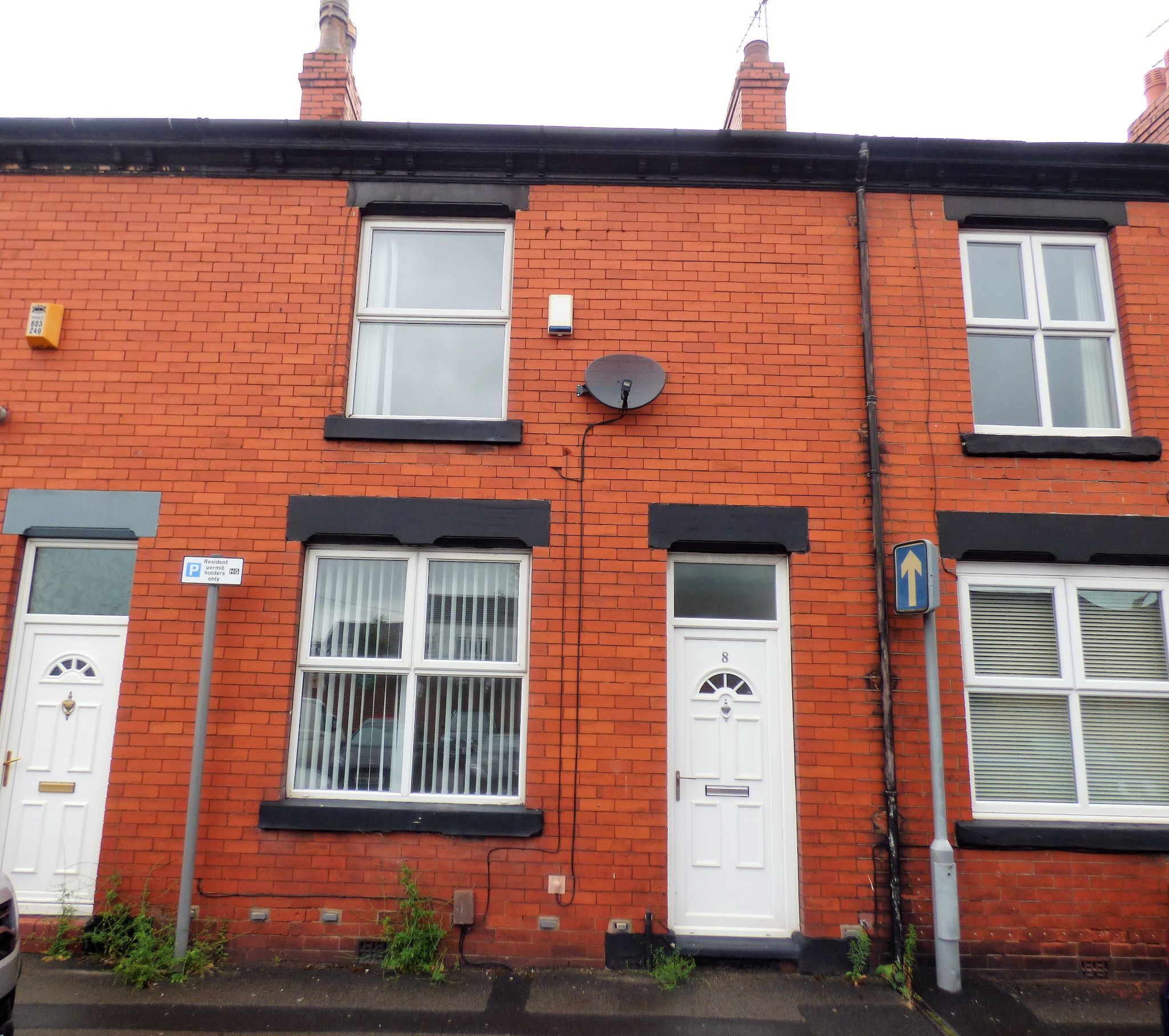 2 bedroom mid terraced house Sold in Stockport - Photograph 1.