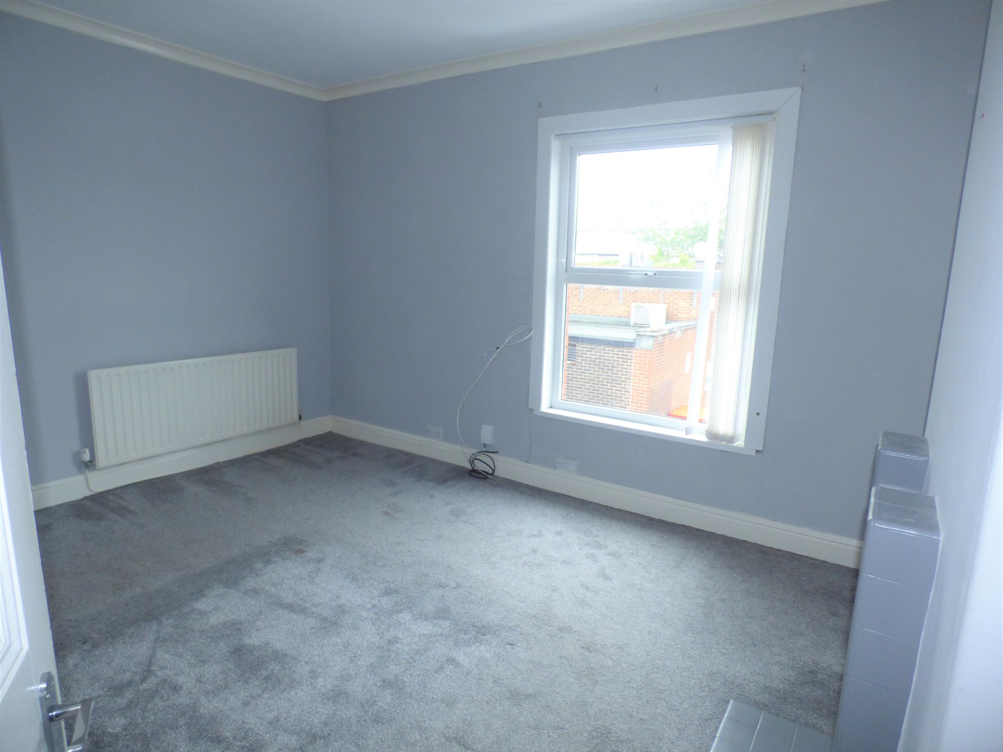 2 bedroom mid terraced house Sold in Stockport - Photograph 2.