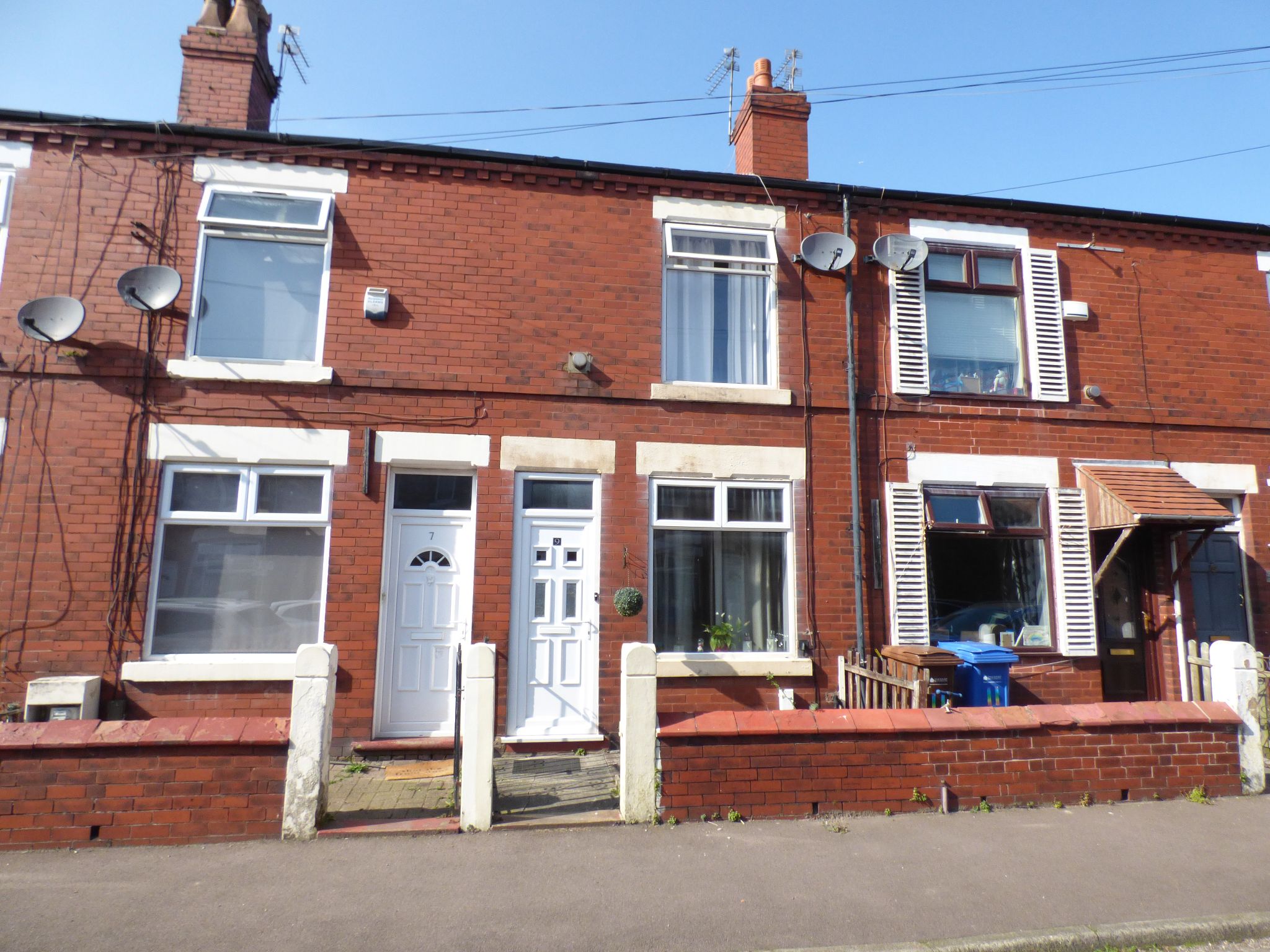 2 bedroom mid terraced house Sold in Stockport - Photograph 1.