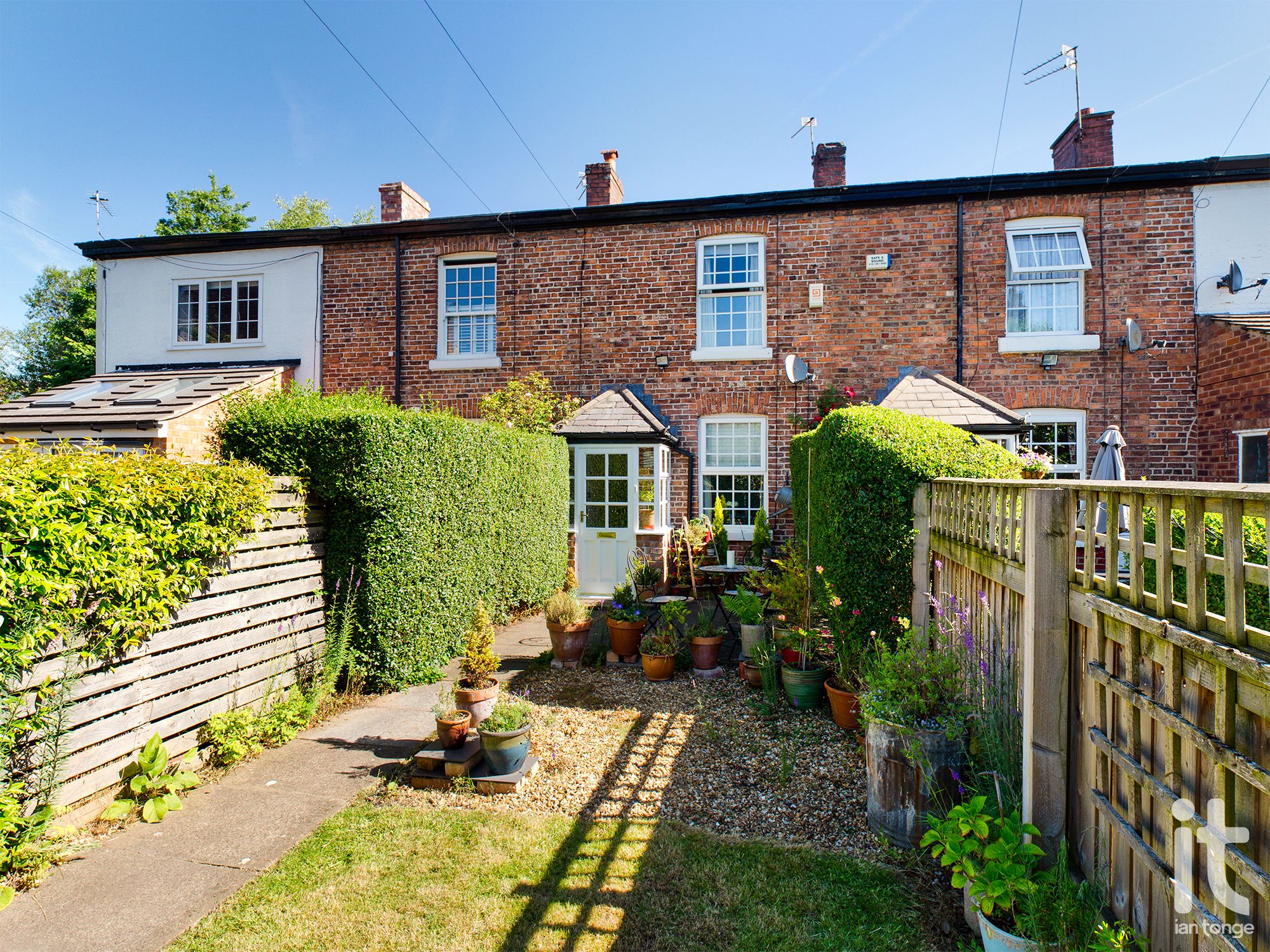 2 bedroom mid terraced house Sold in Sale - Photograph 1.