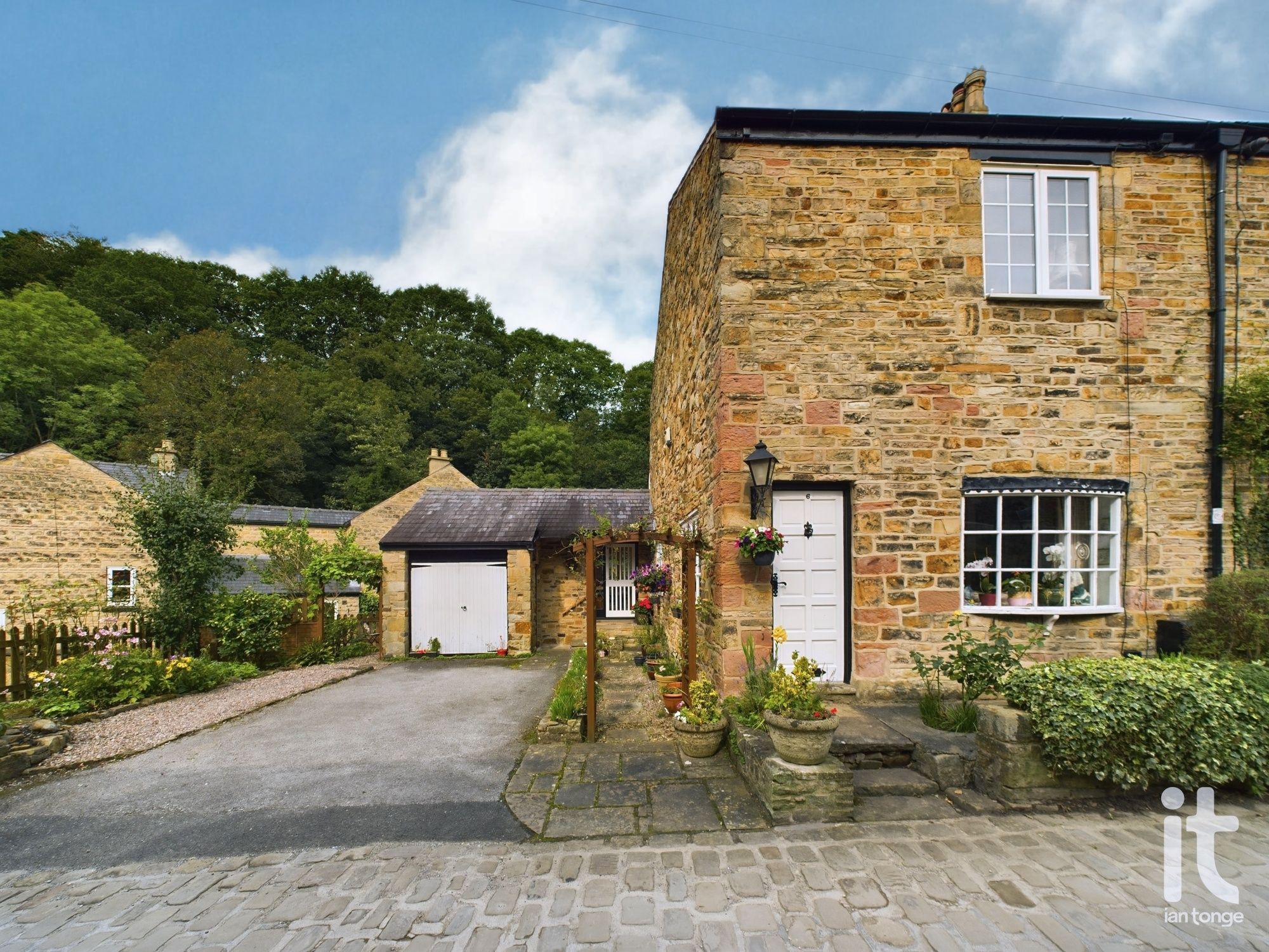 2 bedroom end terraced house SSTC in Stockport - Photograph 1.