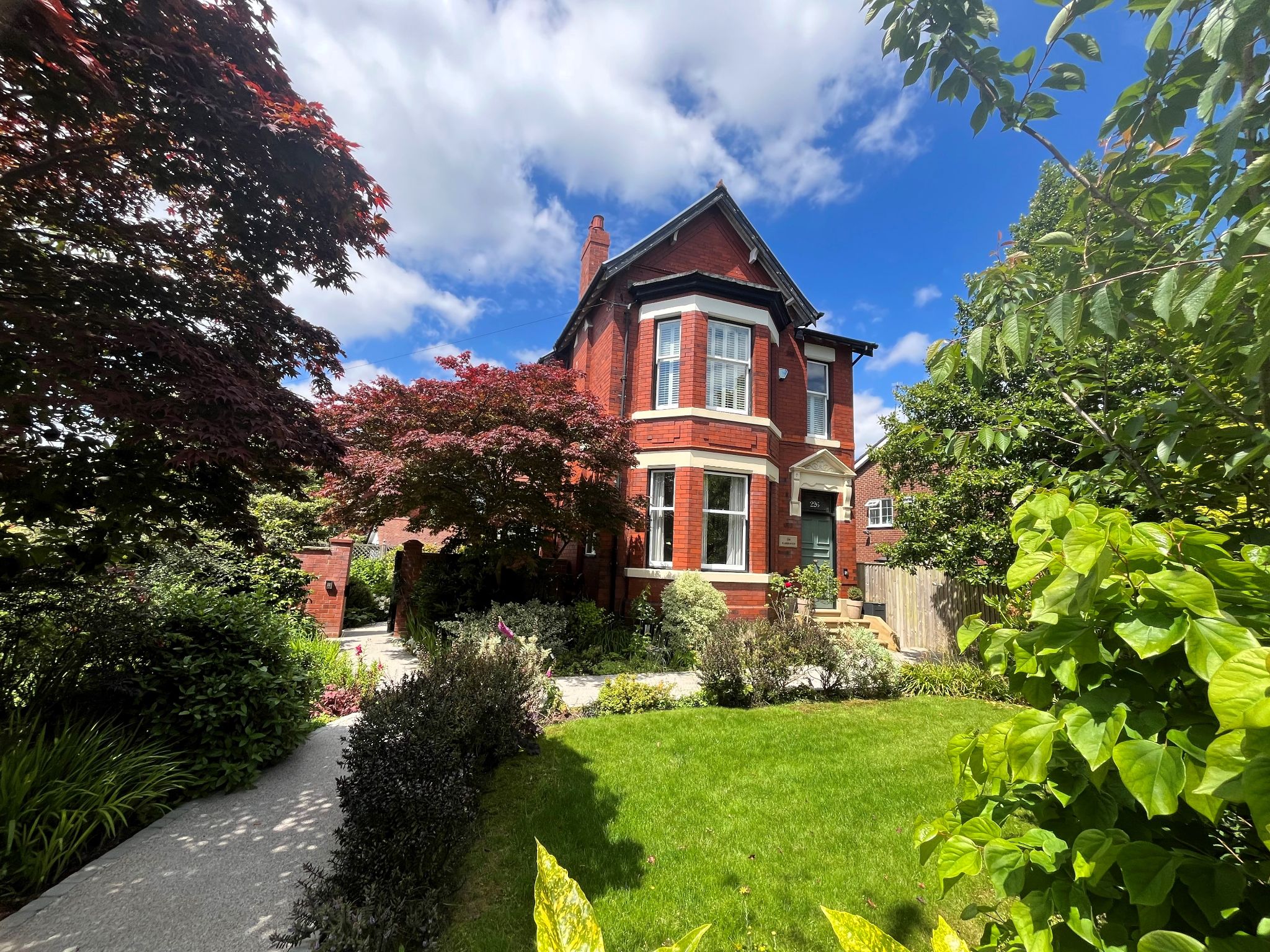 4 bedroom detached house Sold in Stockport - Photograph 1.