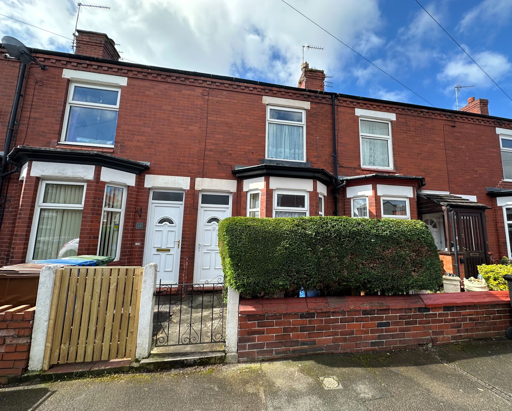2 bedroom mid terraced house Sold in Stockport - Photograph 1.