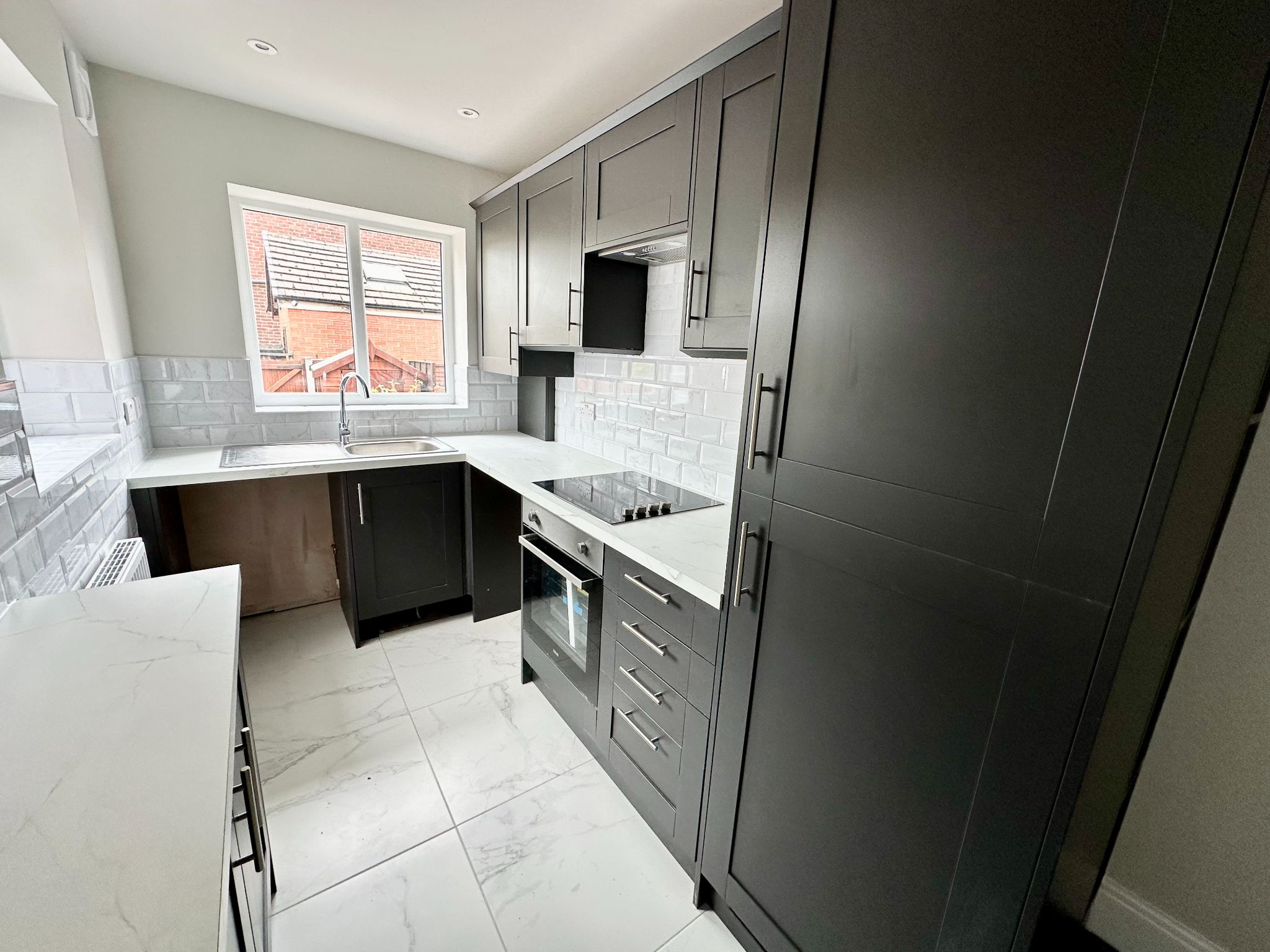 2 bedroom mid terraced house To Let in Stockport - Property photograph.