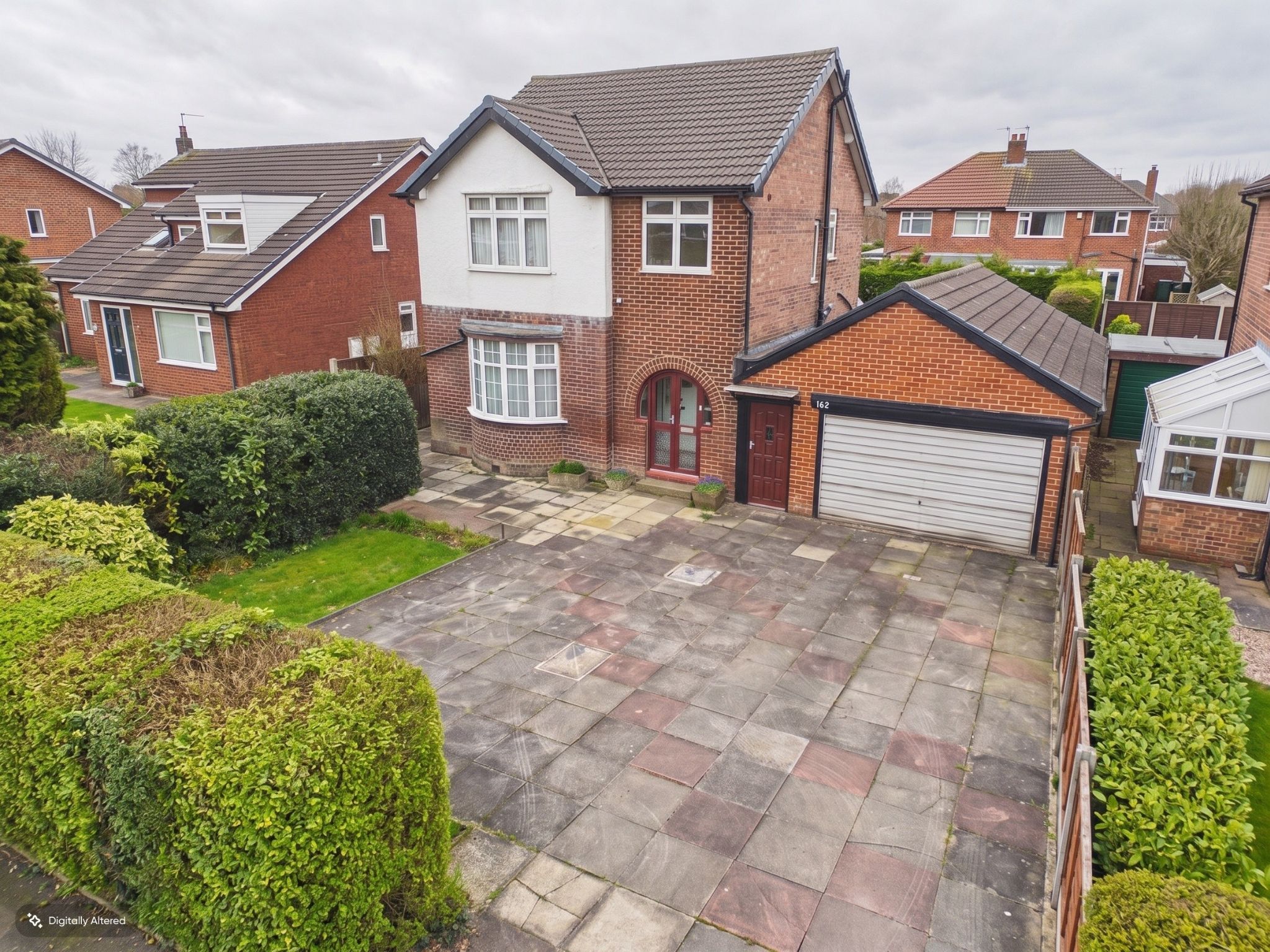 4 bedroom detached house For Sale in Stockport - Photograph 1.