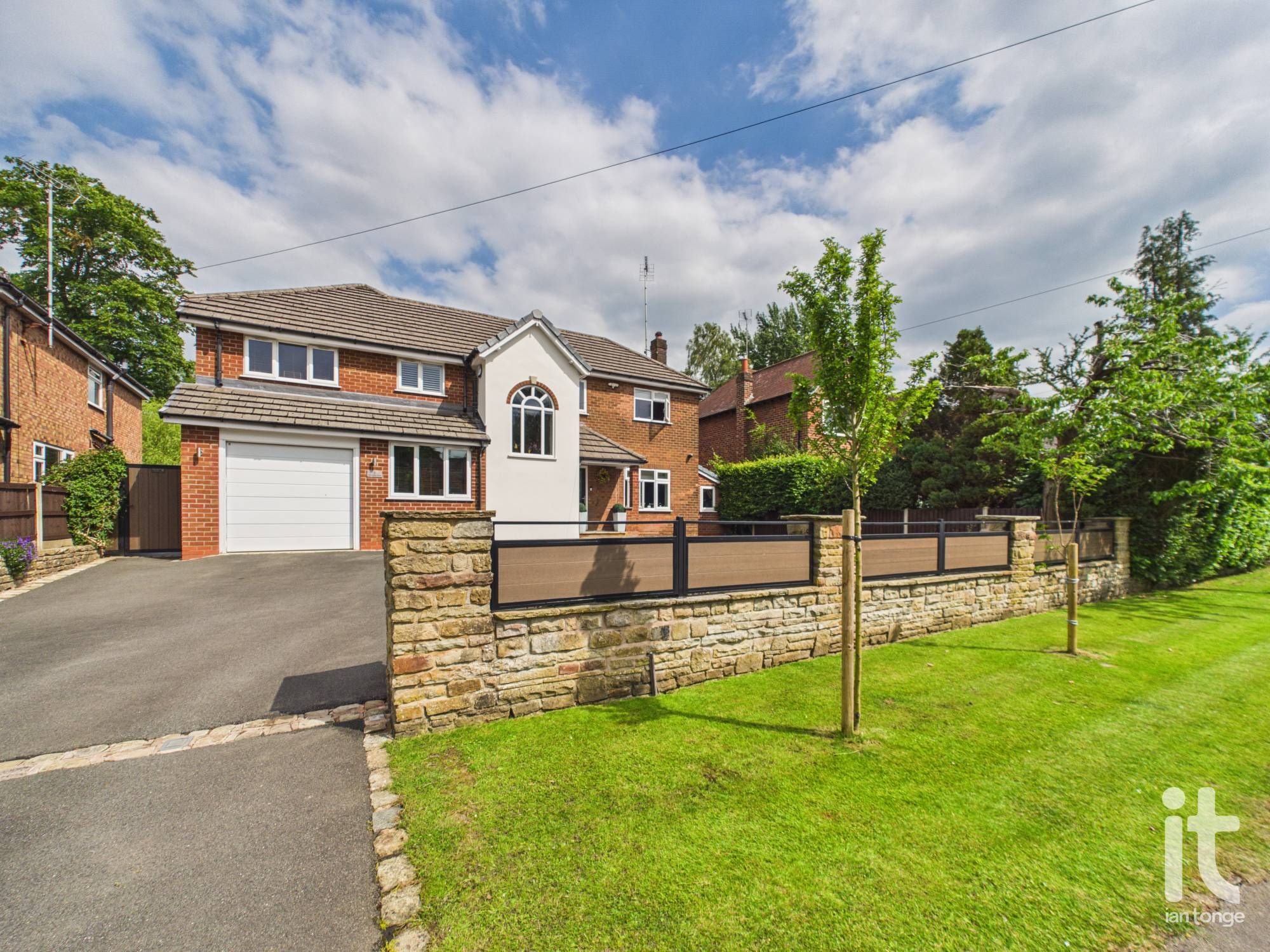 5 bedroom detached house For Sale in Stockport - Photograph 1.