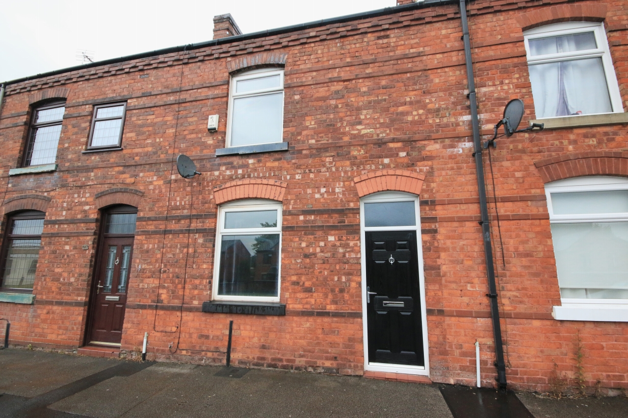2 bedroom mid terraced house Let in Wigan - Photograph 1.