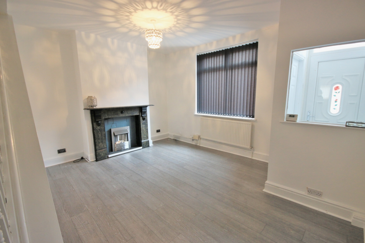 2 bedroom mid terraced house Let in Wigan - Photograph 2.