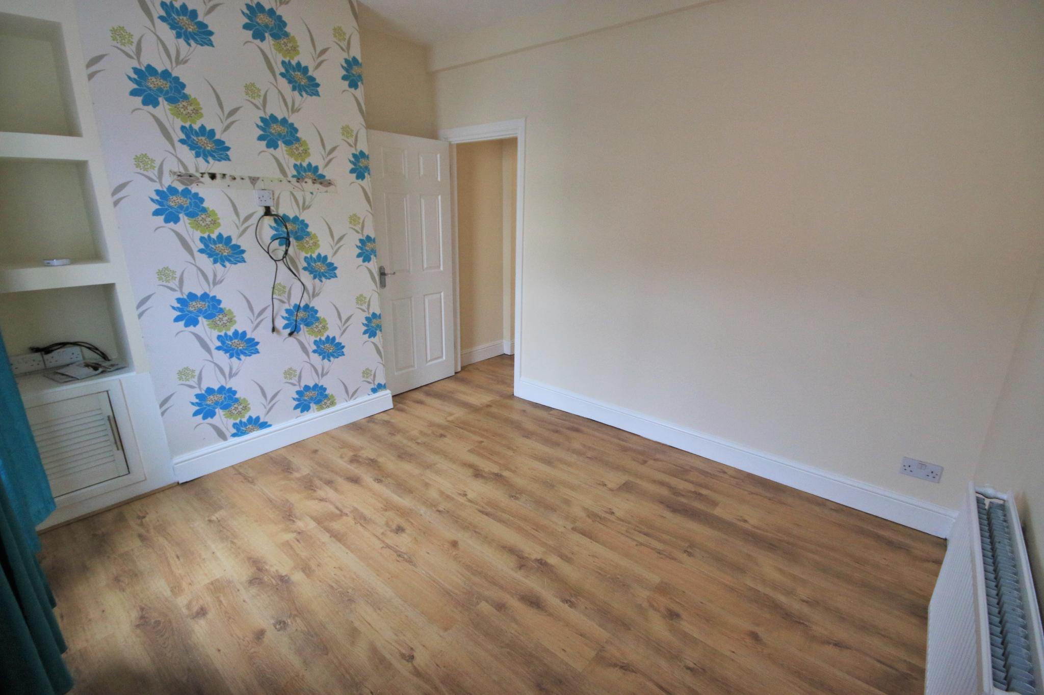2 bedroom mid terraced house Let in Wigan - Photograph 2.