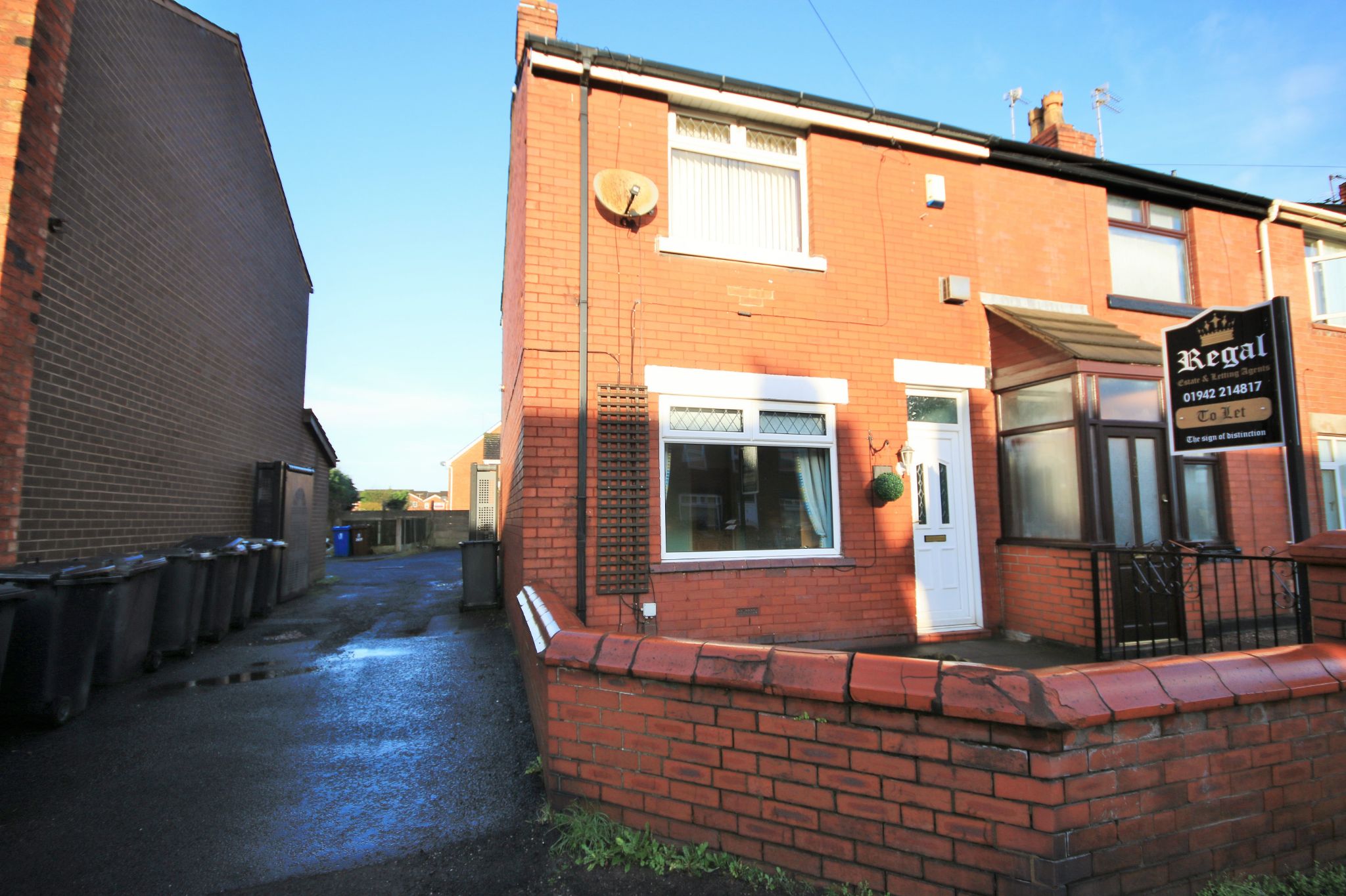 2 bedroom mid terraced house Let in Wigan - Photograph 1.