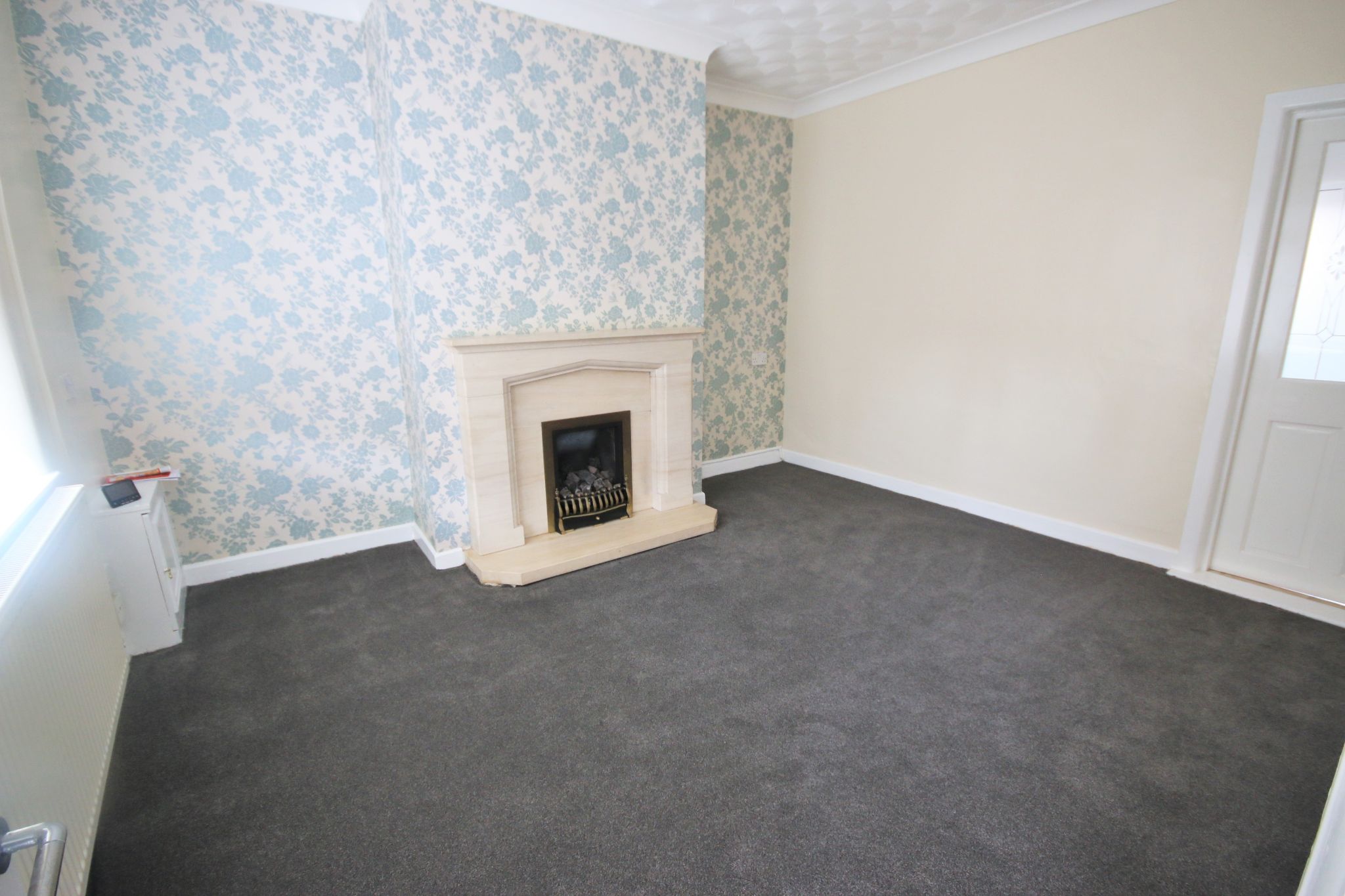 2 bedroom mid terraced house Let in Wigan - Photograph 2.