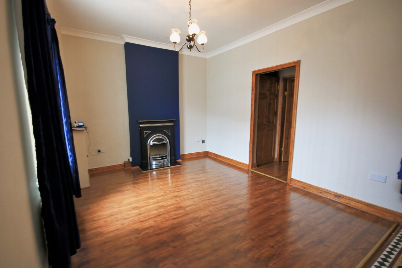 2 bedroom mid terraced house Let in Wigan - Photograph 2.