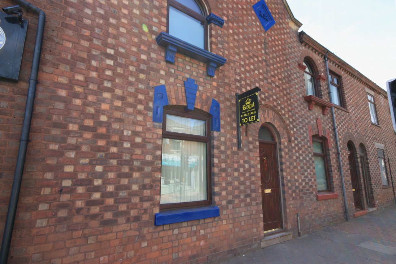 2 bedroom mid terraced house Let in Wigan - Photograph 1.