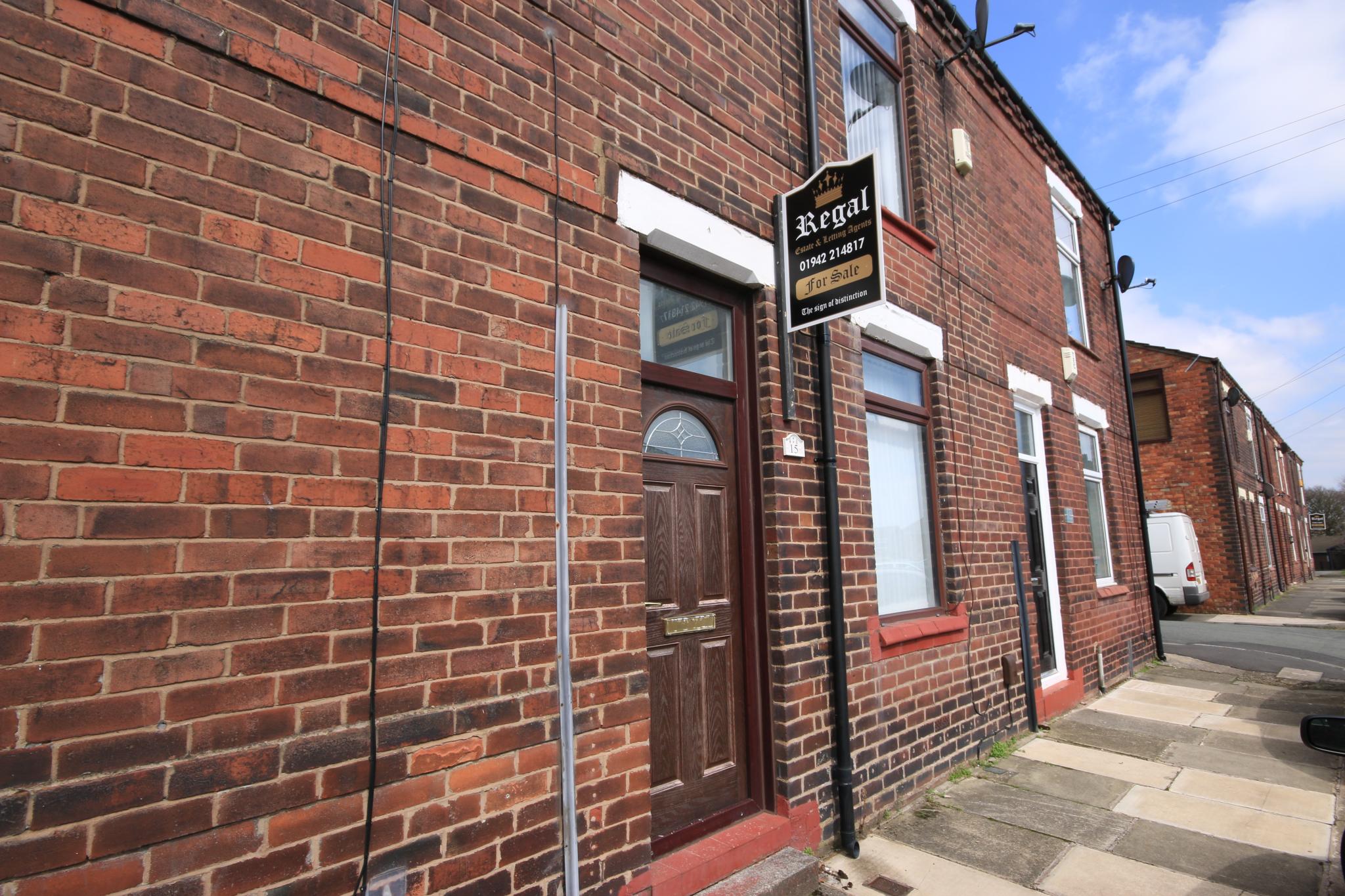 2 bedroom mid terraced house Let in Wigan - Photograph 1.