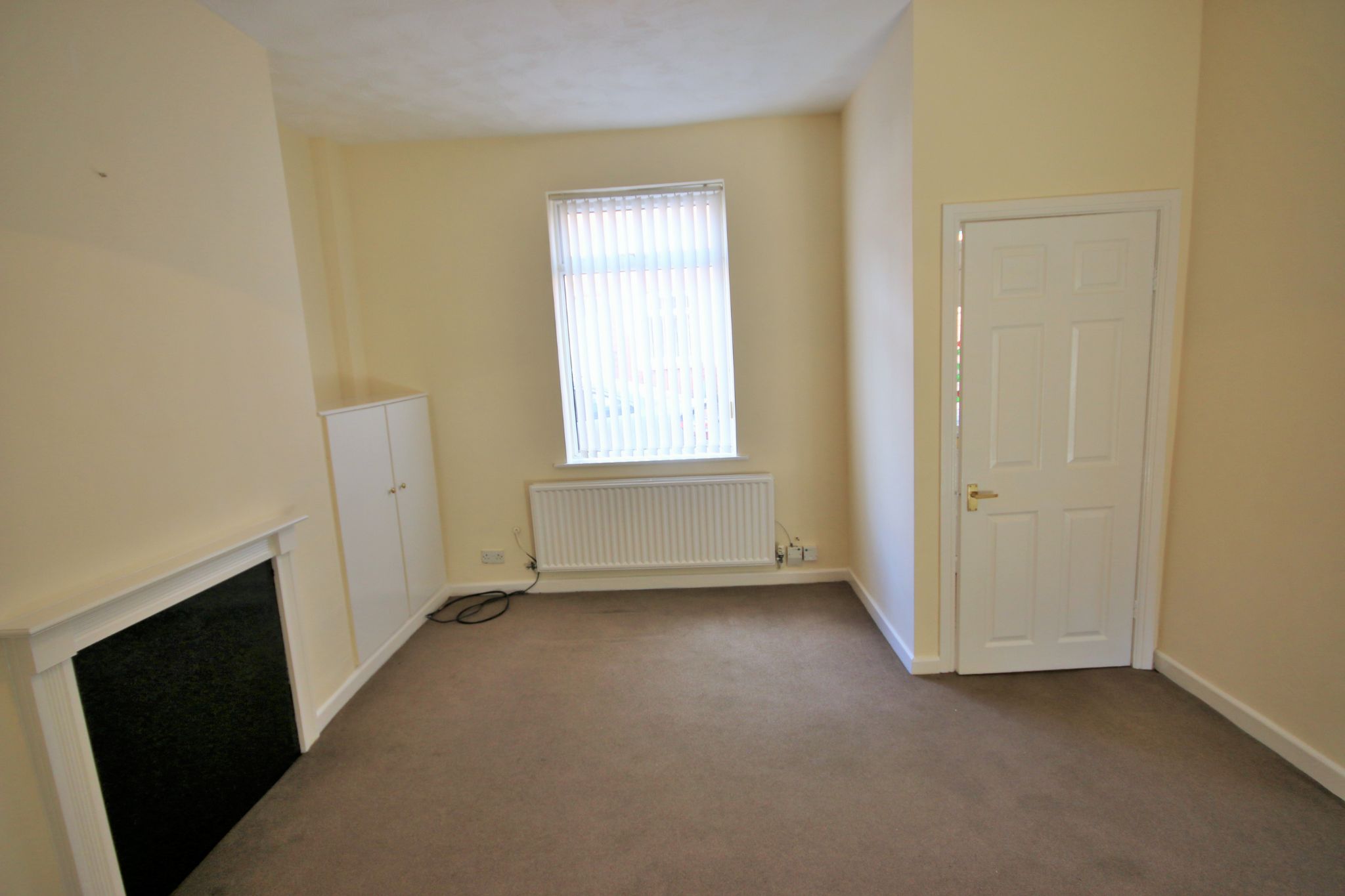 2 bedroom mid terraced house Let in Wigan - Photograph 2.