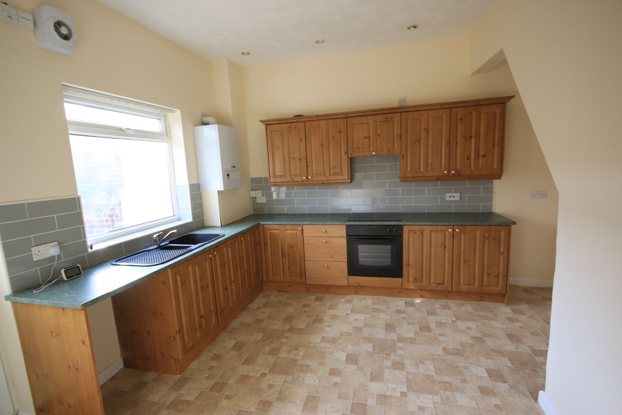 2 bedroom mid terraced house Let in Wigan - Photograph 3.
