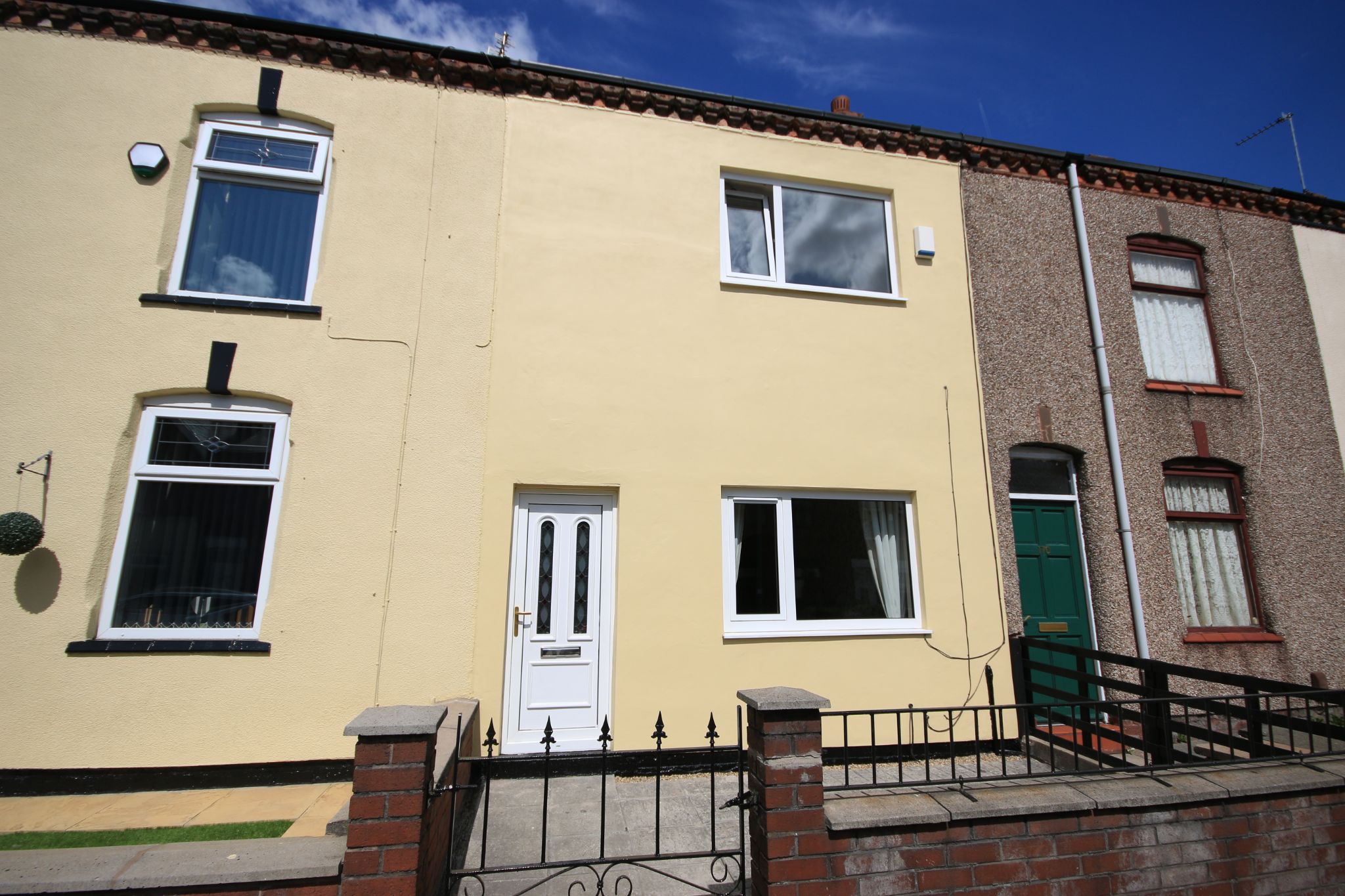 2 bedroom mid terraced house Let in Wigan - Photograph 1.