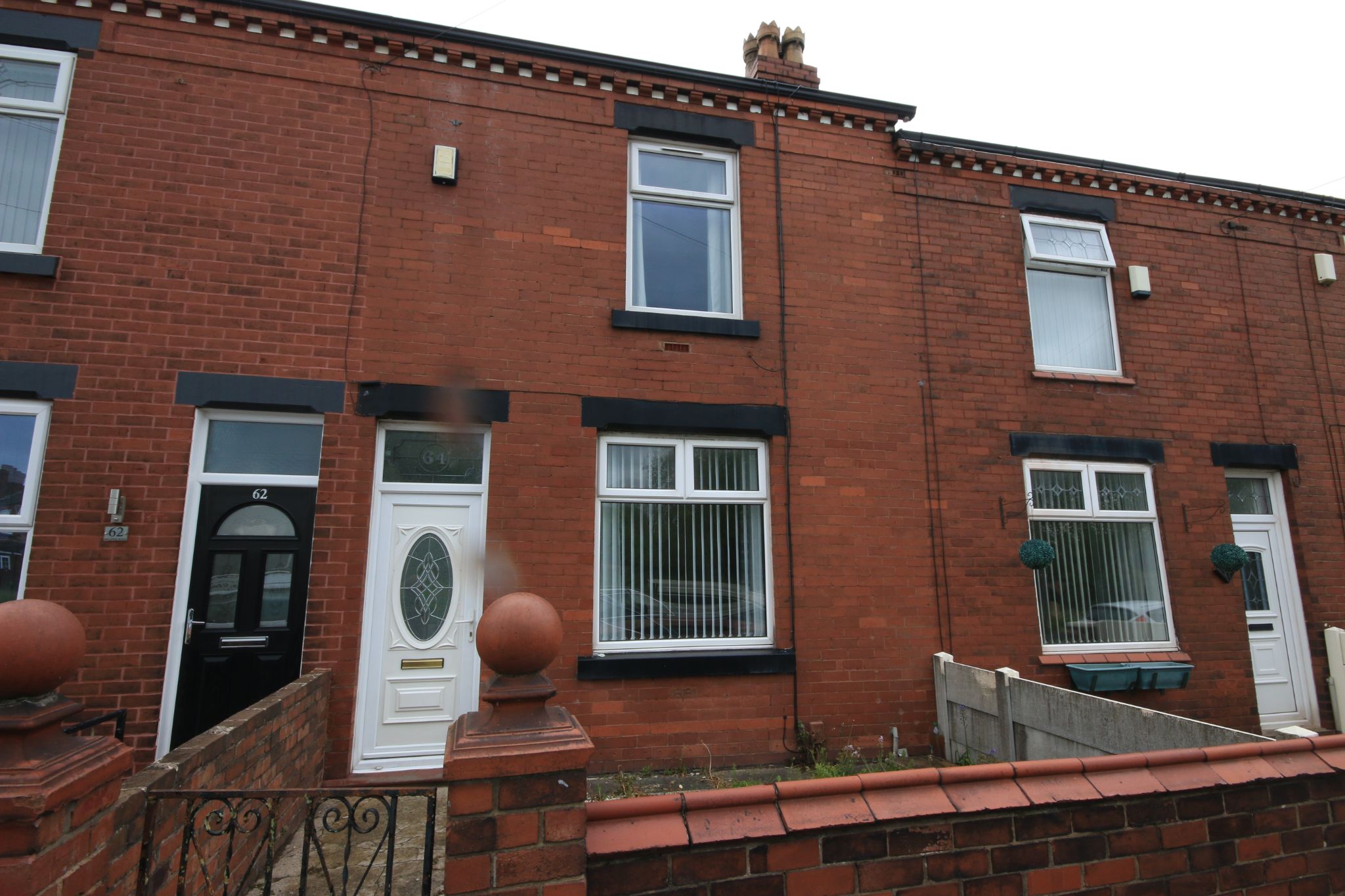 2 bedroom mid terraced house Let in Wigan - Photograph 1.