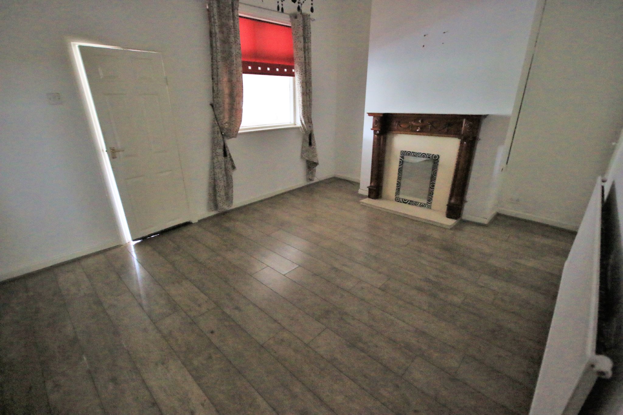 3 bedroom mid terraced house Let in Wigan - Photograph 2.