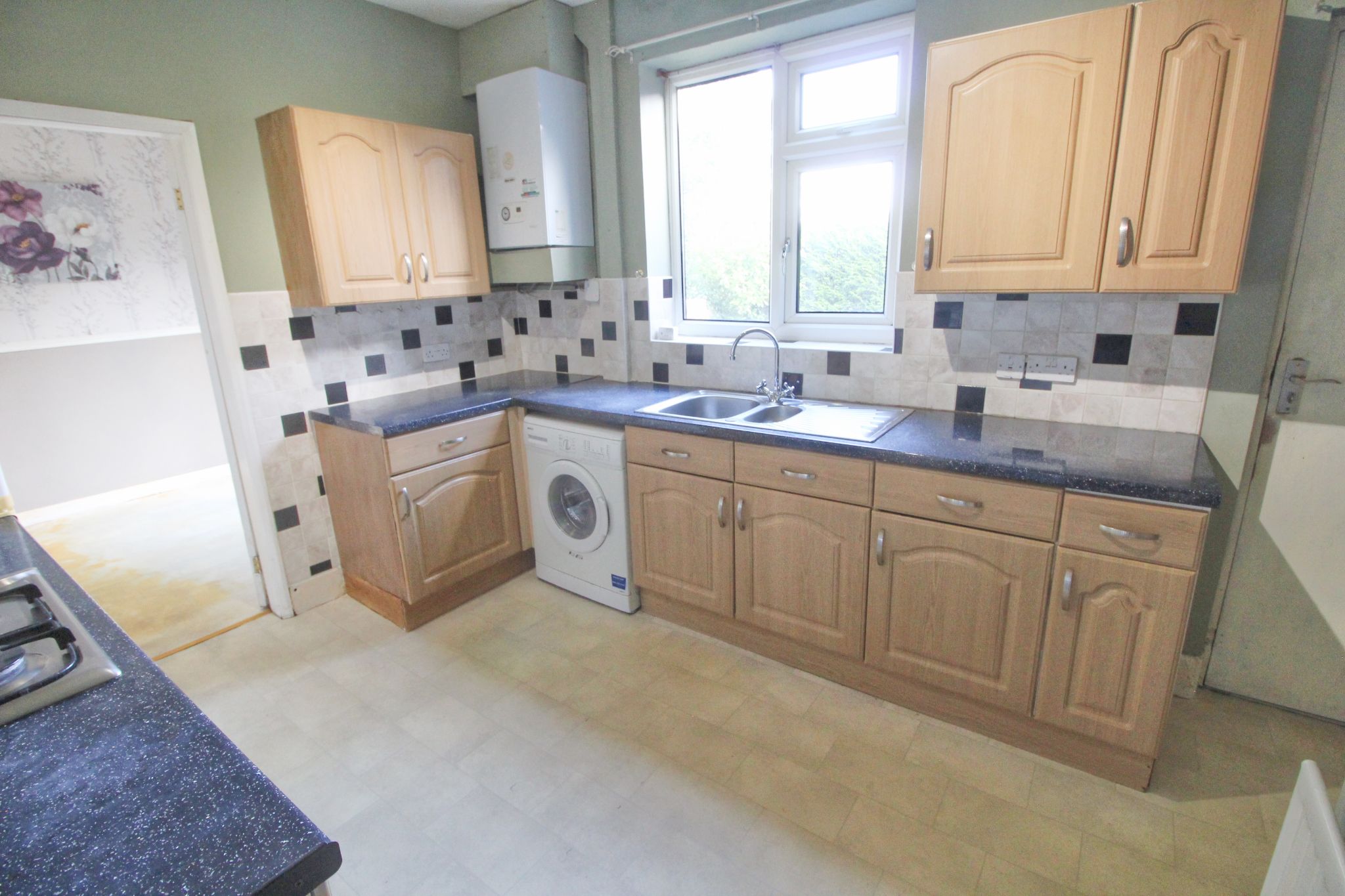 3 bedroom mid terraced house For Sale in Wigan - Photograph 8.