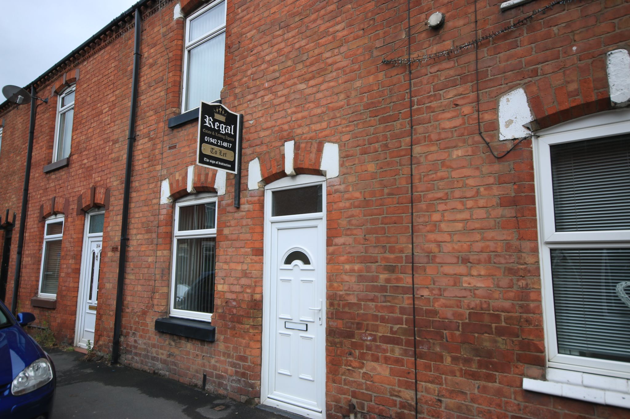2 bedroom mid terraced house Let in Wigan - Photograph 1.