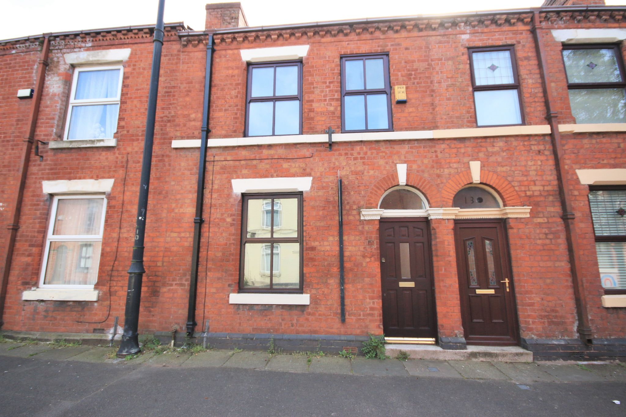 2 bedroom mid terraced house Let in Wigan - Photograph 1.