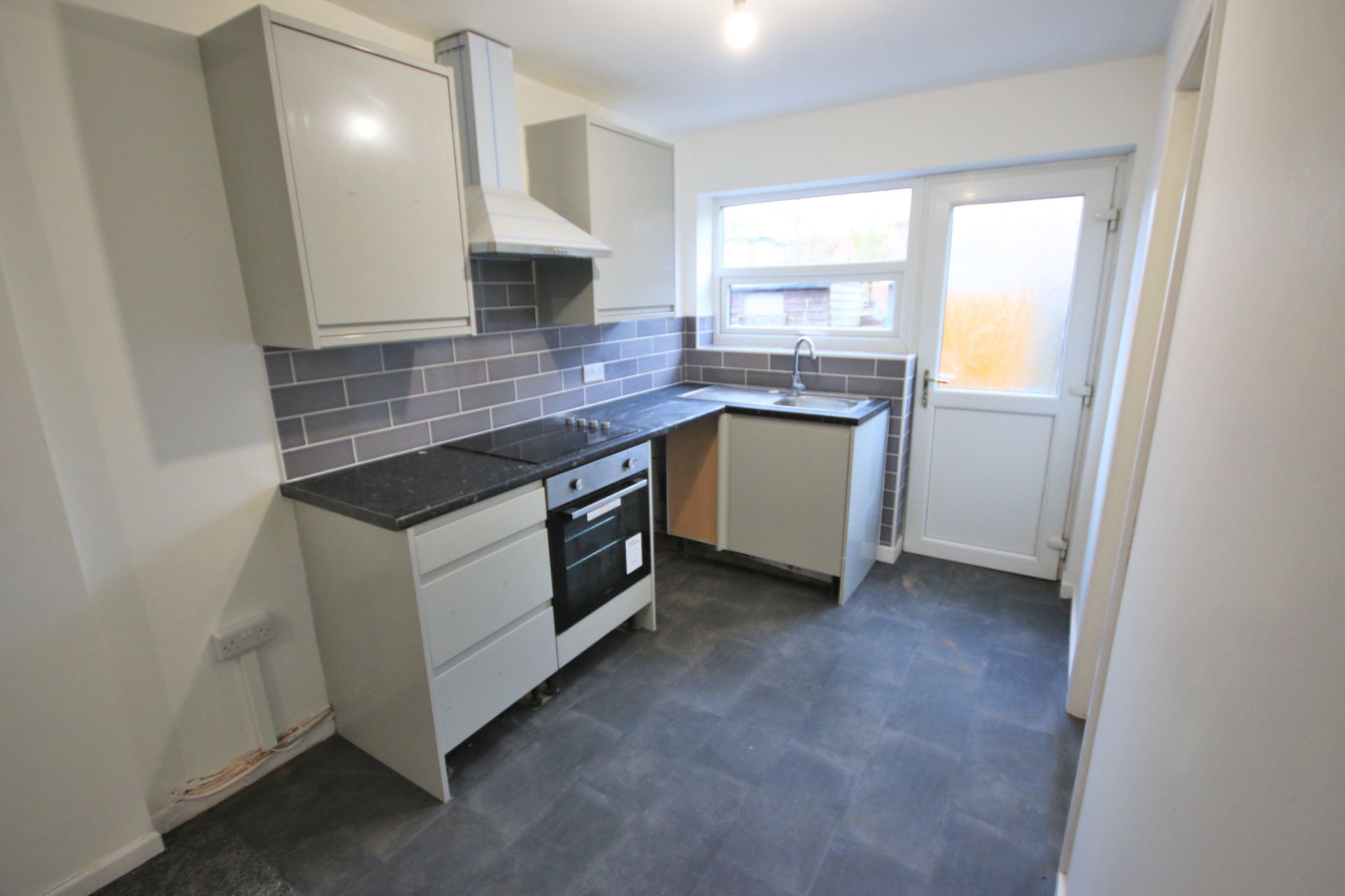 2 bedroom mid terraced house To Let in Wigan - Photograph 4.