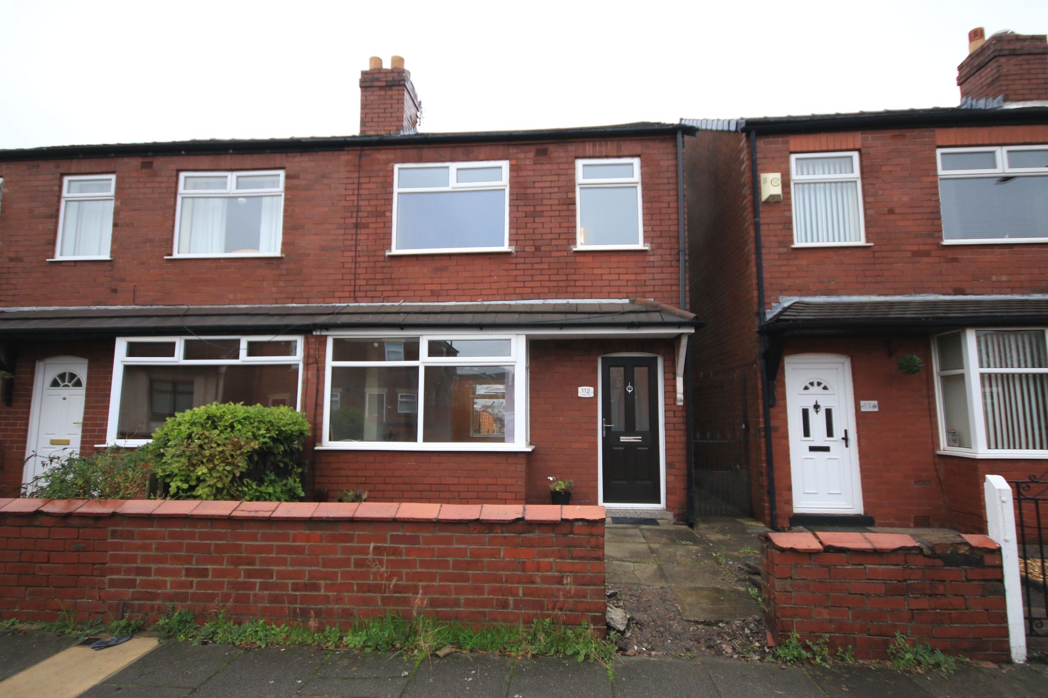 3 bedroom mid terraced house Let in Wigan - Photograph 1.