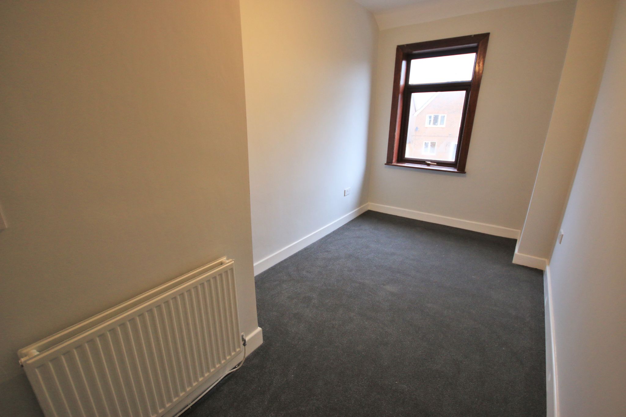 3 bedroom mid terraced house To Let in Wigan - Photograph 9.