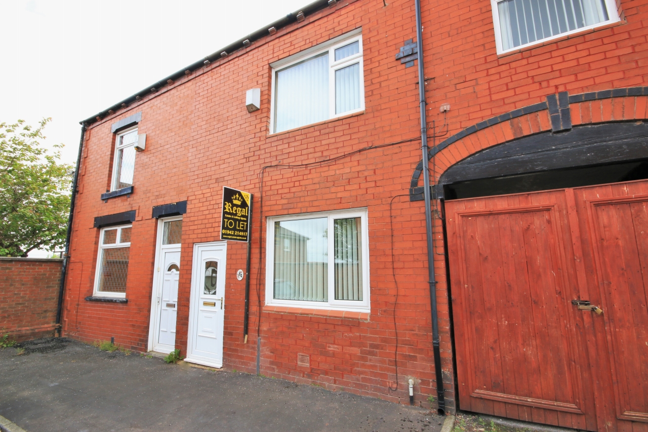 3 bedroom mid terraced house Let in Wigan - Photograph 1.