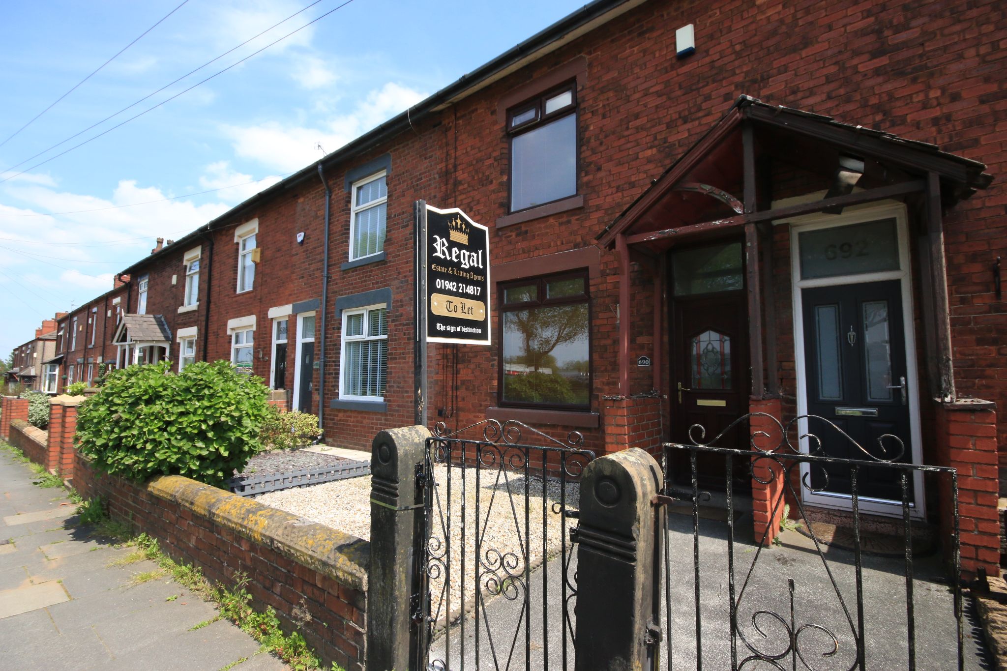 2 bedroom mid terraced house Let in Wigan - Photograph 2.