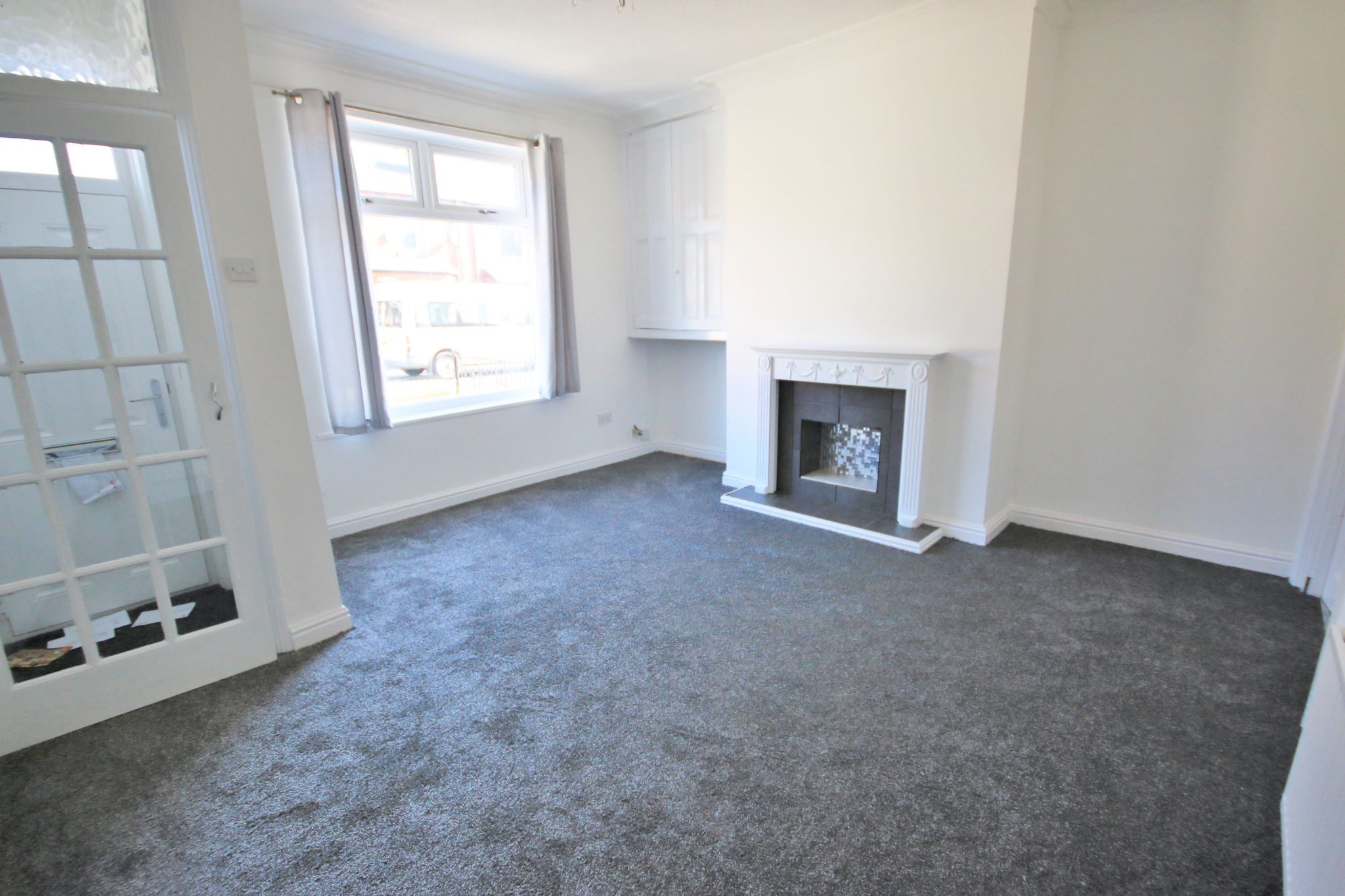 2 bedroom mid terraced house Let in Wigan - Photograph 2.