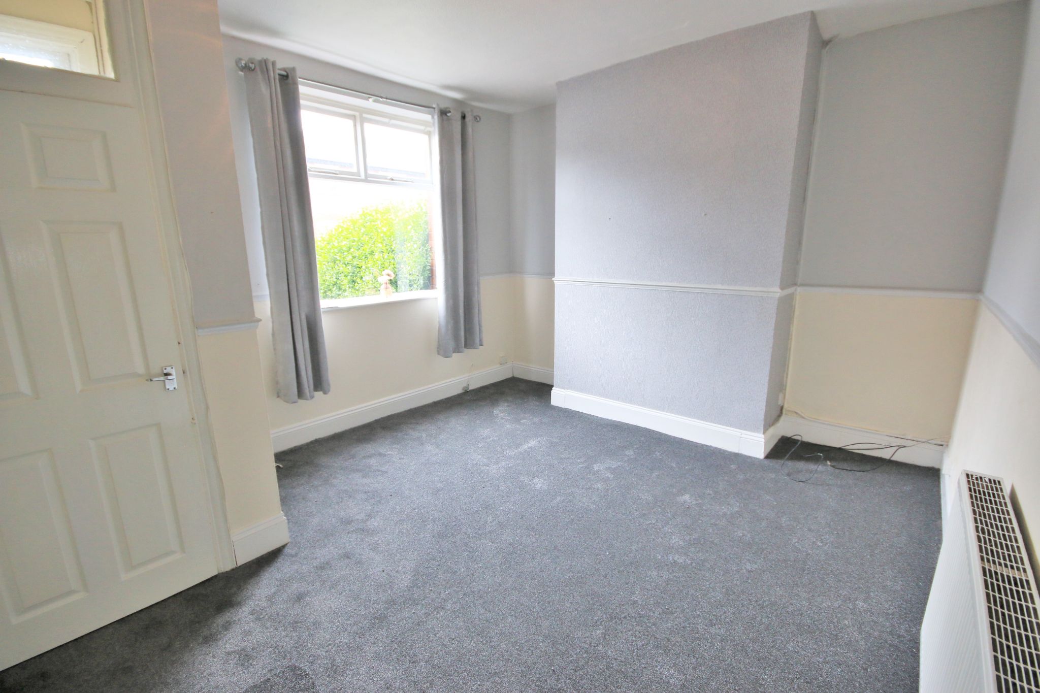 2 bedroom mid terraced house Let in Wigan - Photograph 2.