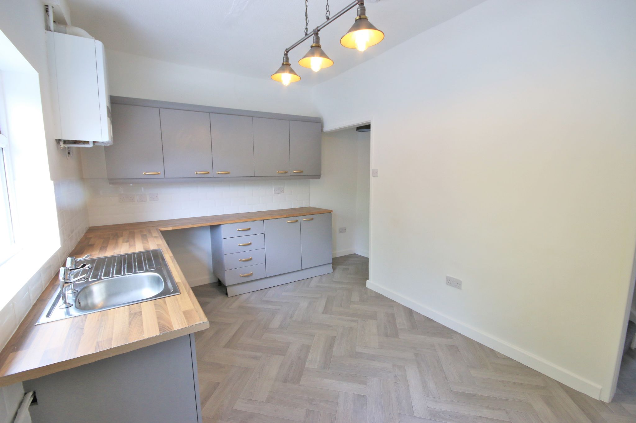 2 bedroom mid terraced house Let in Wigan - Photograph 4.