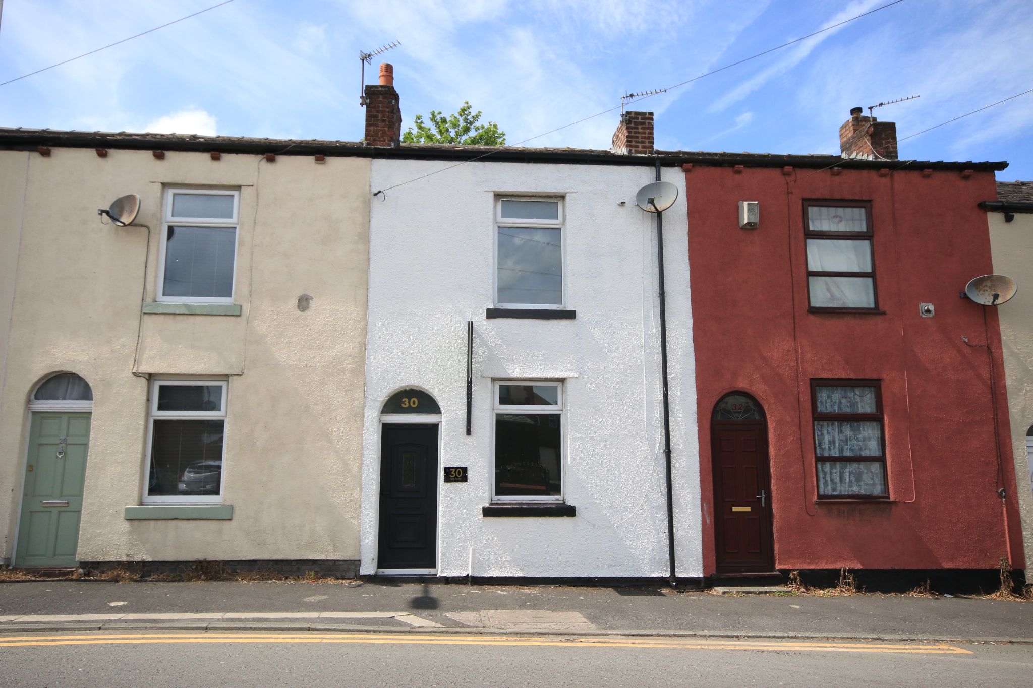2 bedroom mid terraced house Let in Wigan - Photograph 1.