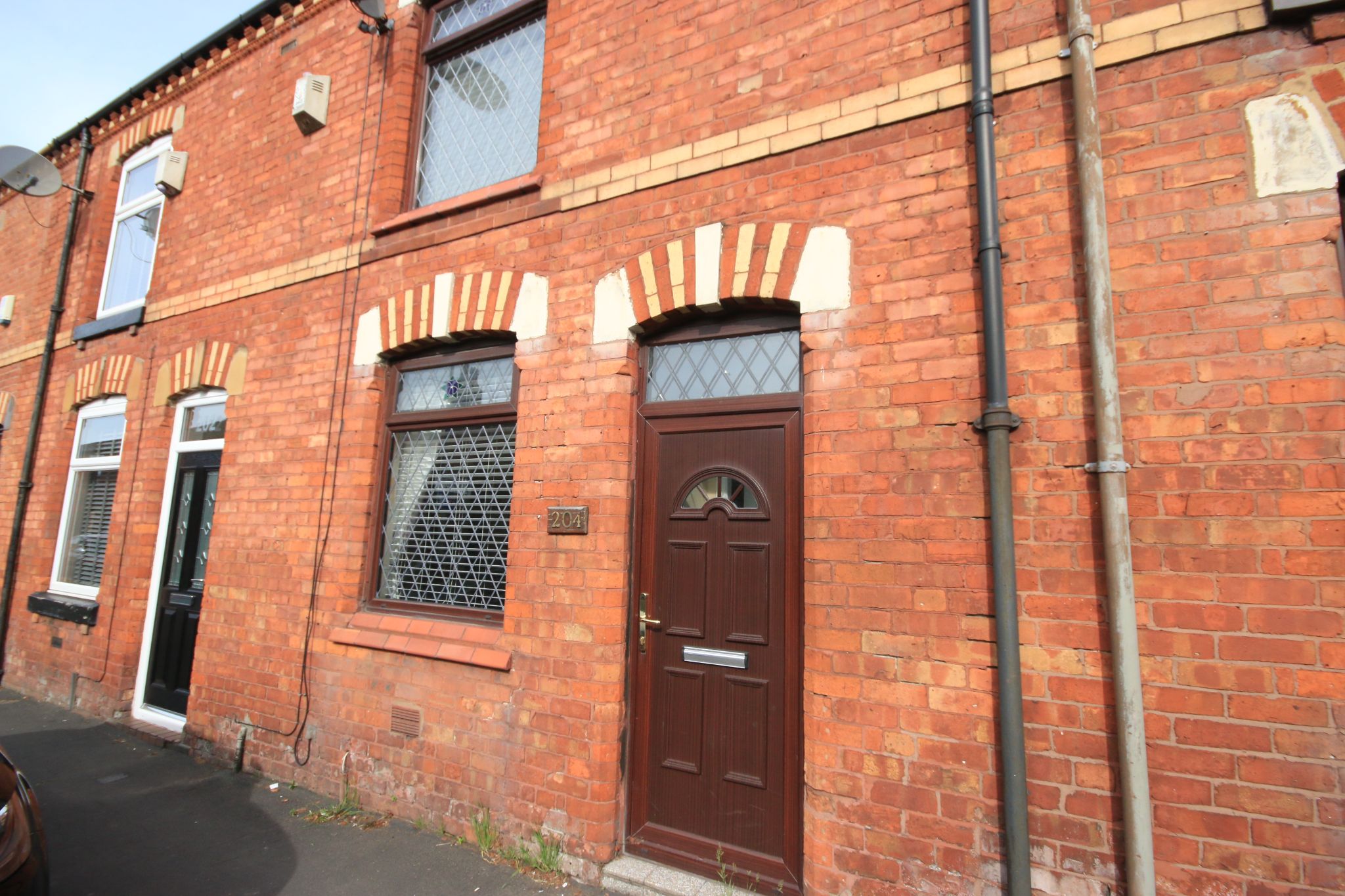 3 bedroom mid terraced house Let Agreed in Wigan - Photograph 1.