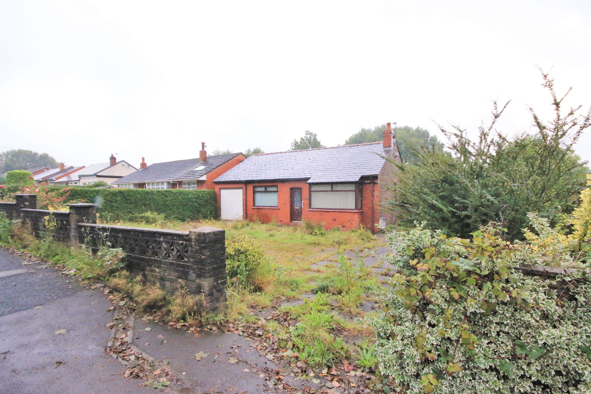 2 bedroom detached bungalow Sold in Wigan - Photograph 1.