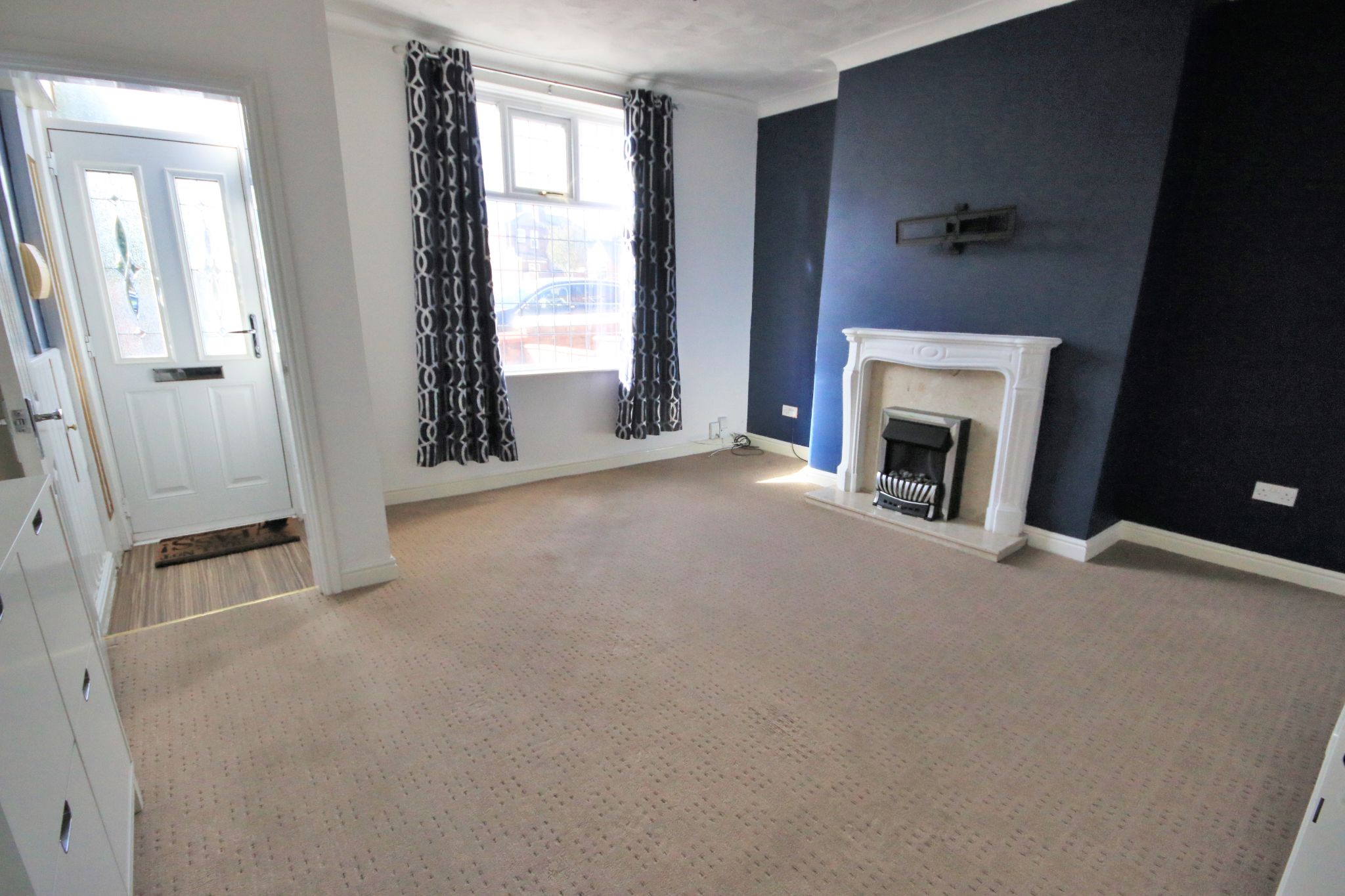 2 bedroom mid terraced house Let in Wigan - Photograph 2.