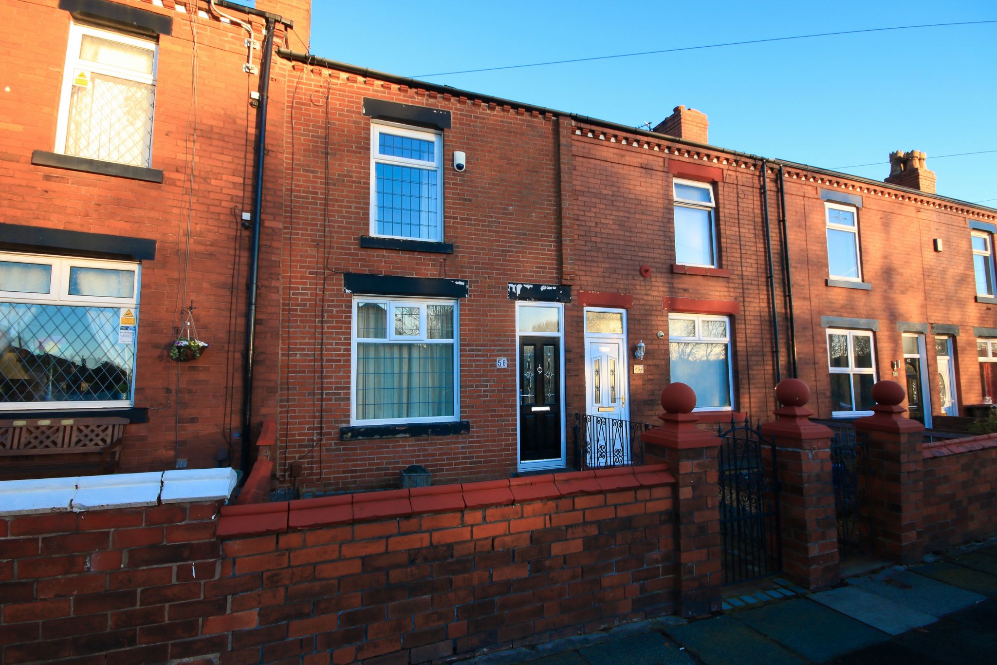 2 bedroom mid terraced house Let in Wigan - Photograph 1.