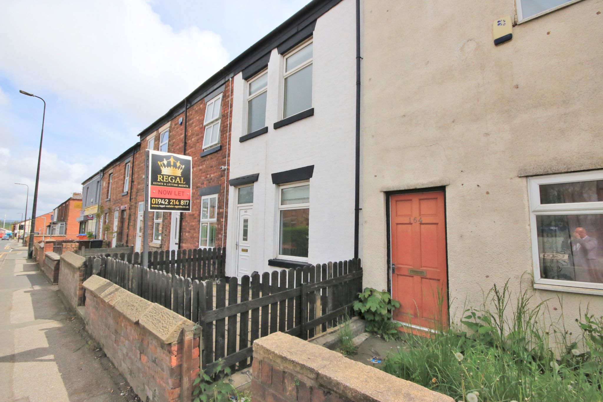 3 bedroom mid terraced house Let in Wigan - Photograph 1.