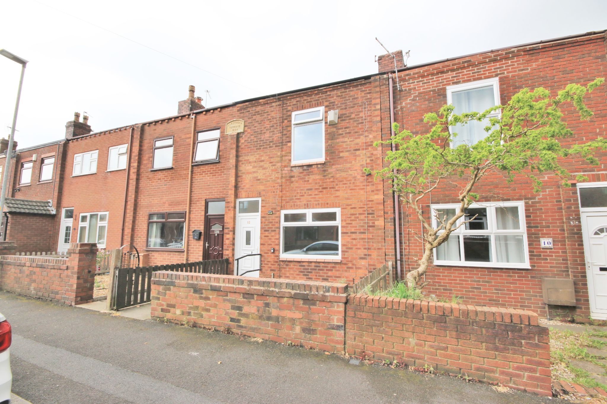 2 bedroom mid terraced house Let Agreed in Wigan - Photograph 1.
