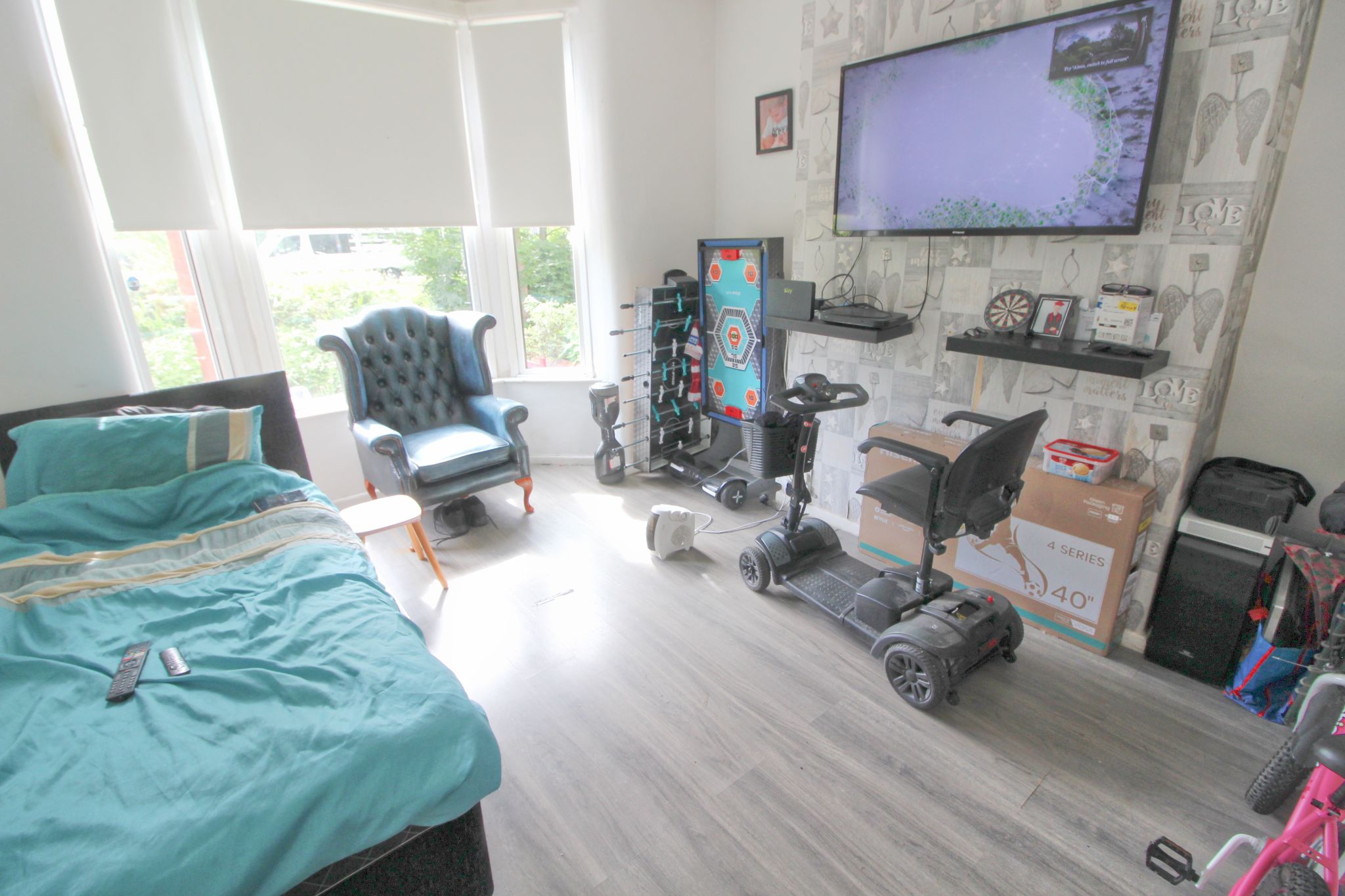 3 bedroom mid terraced house SSTC in Wigan - Photograph 1.