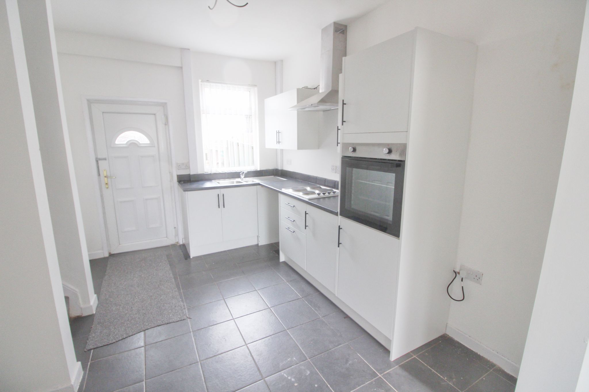 2 bedroom mid terraced house Let in Wigan - Kitchen.