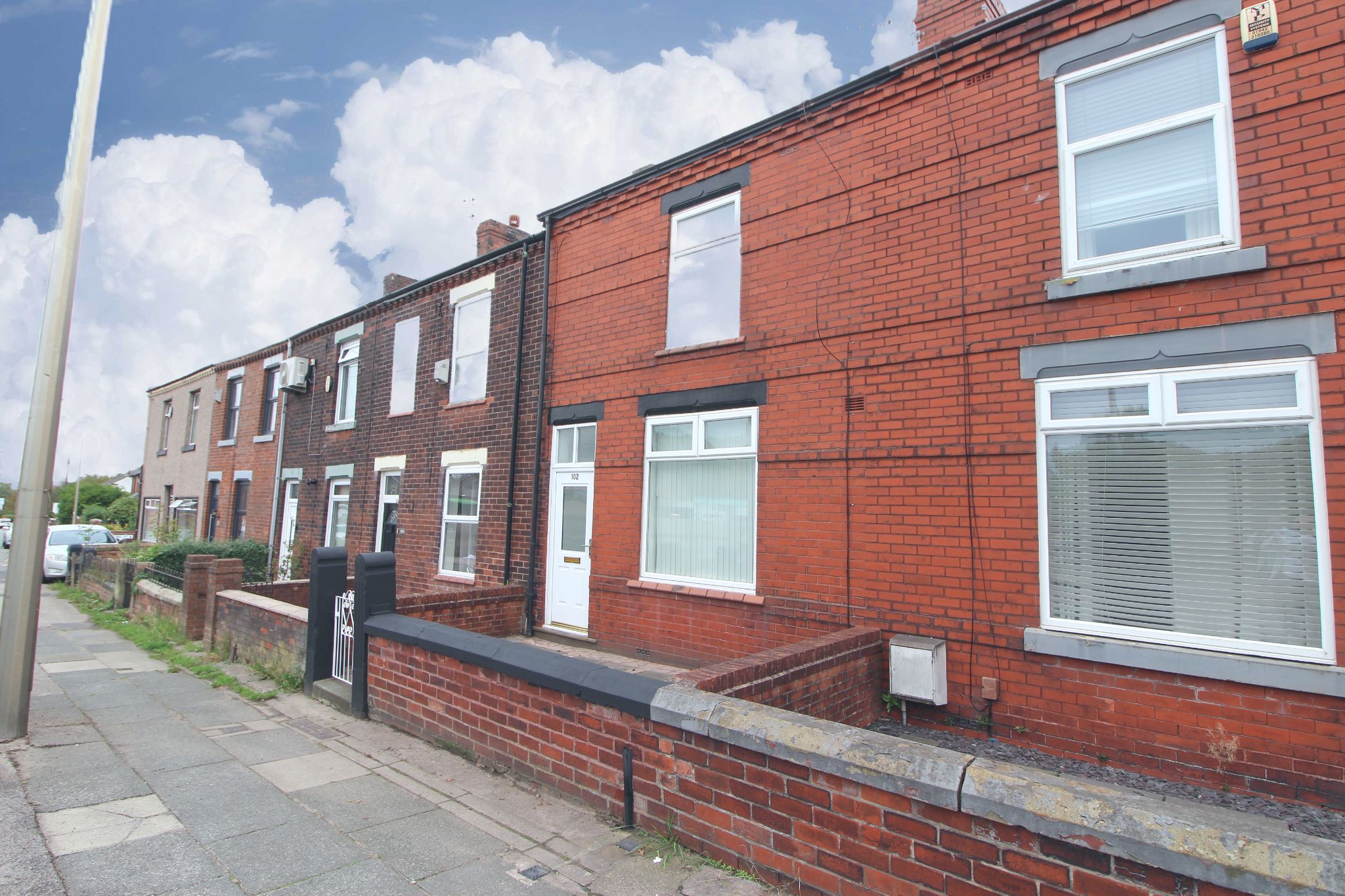 2 bedroom mid terraced house SSTC in Wigan - Photograph 1.