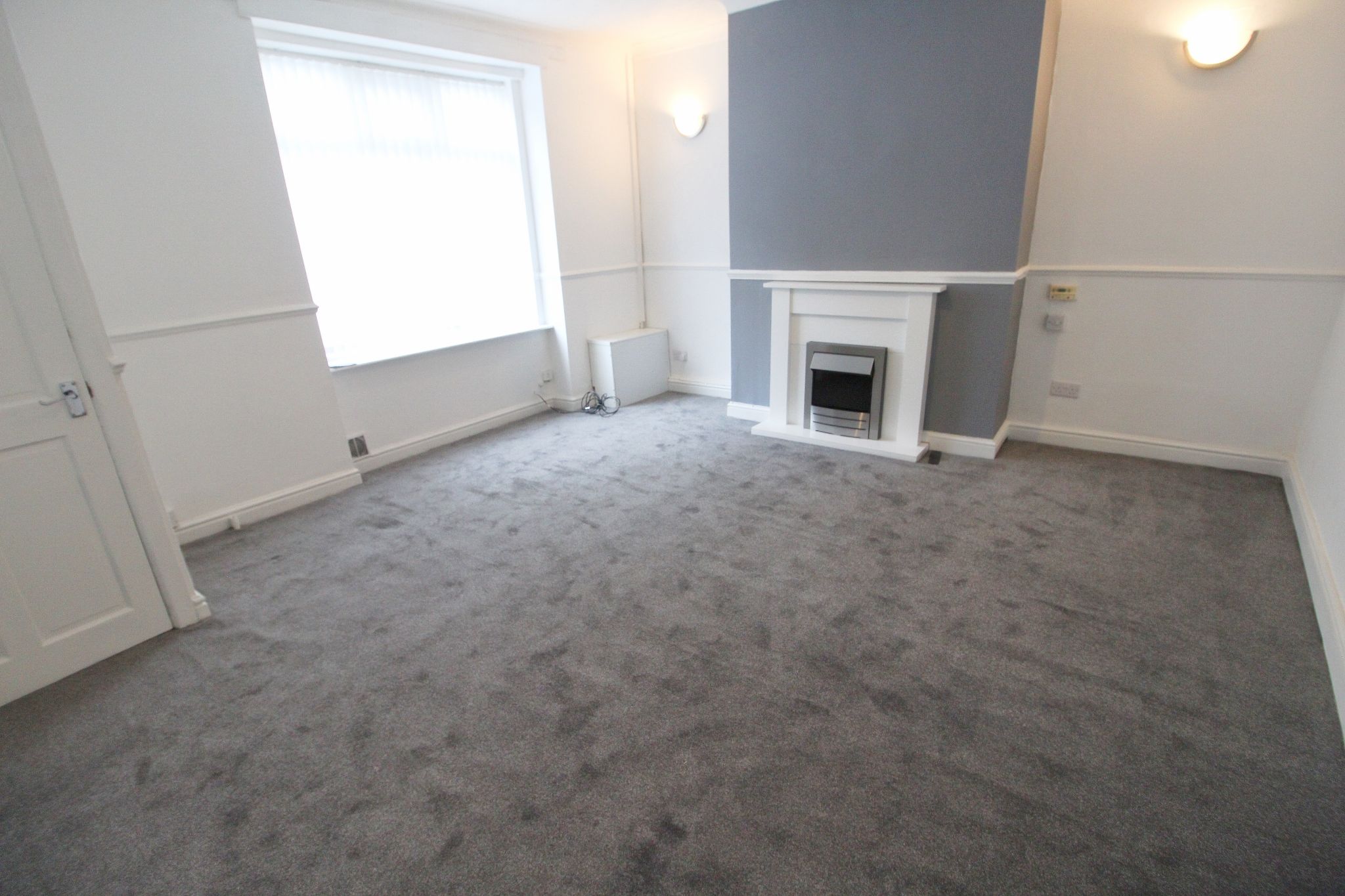 3 bedroom mid terraced house Let in Wigan - Photograph 1.