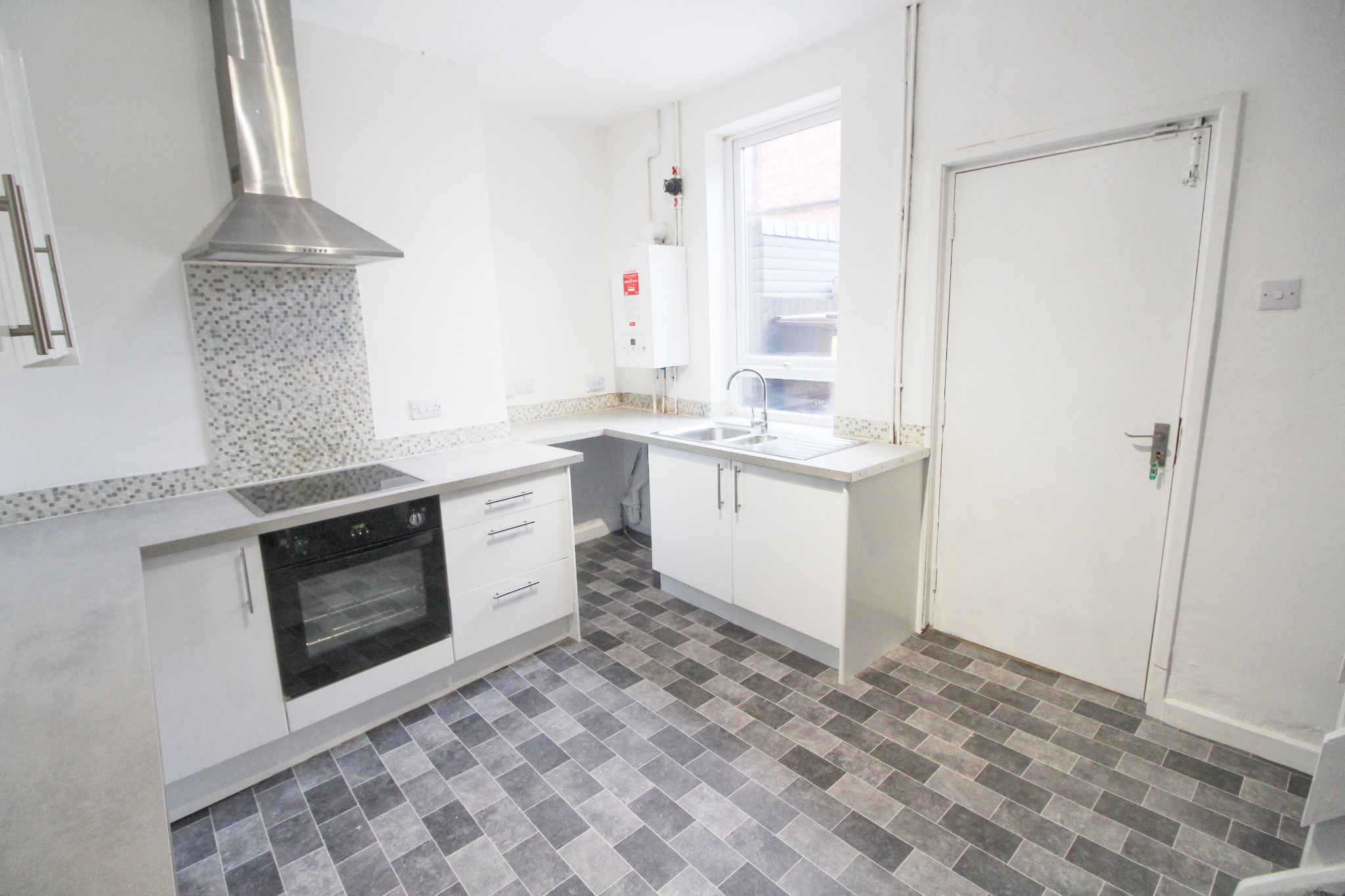 3 bedroom mid terraced house Let in Wigan - Photograph 3.