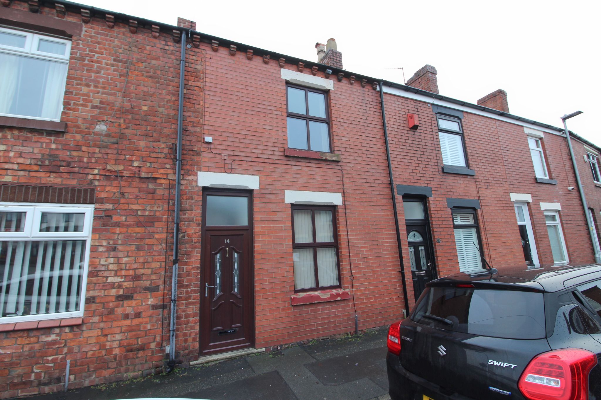 2 bedroom mid terraced house SSTC in Wigan - Photograph 1.