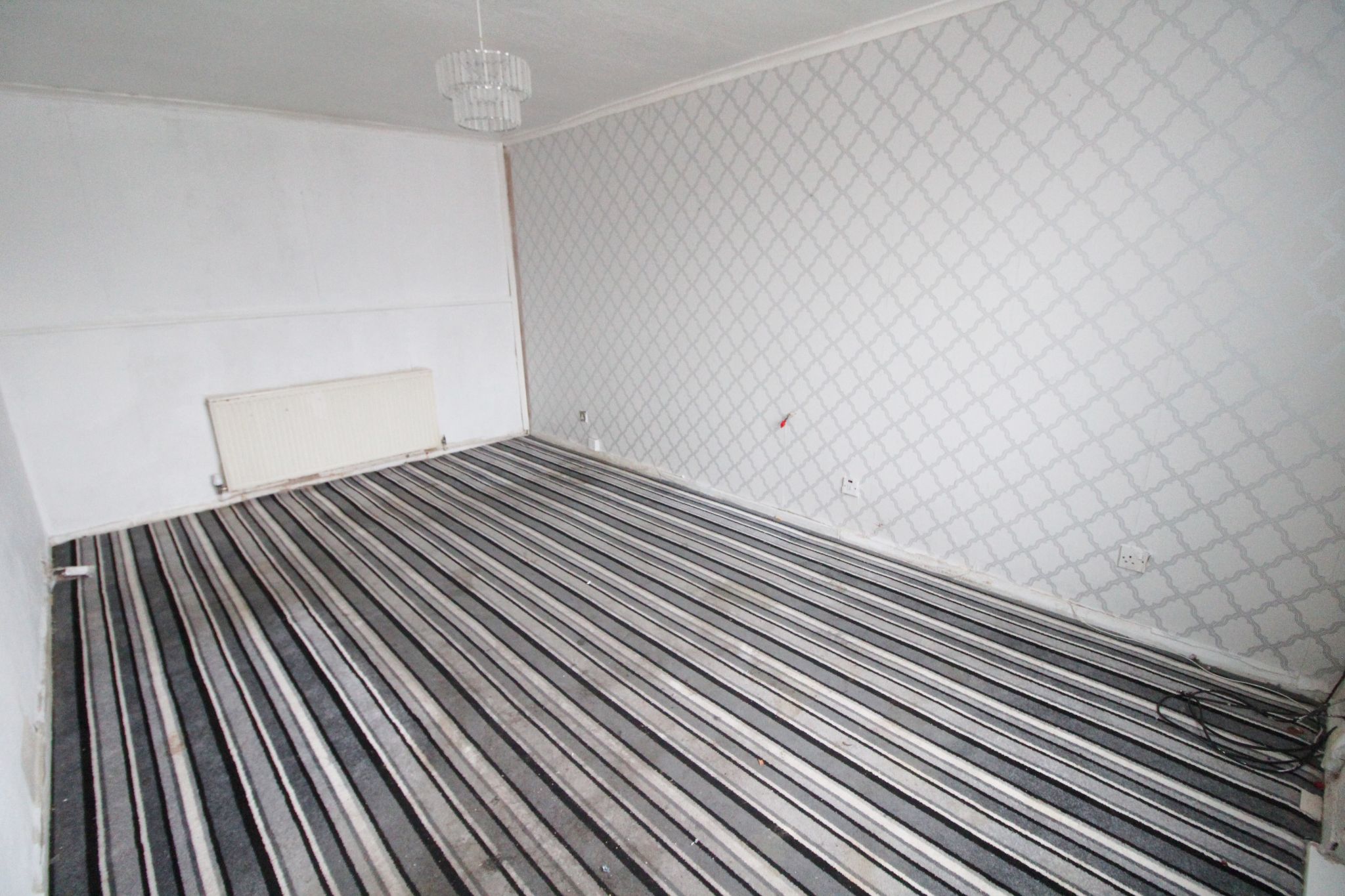 3 bedroom mid terraced house SSTC in Wigan - Photograph 3.
