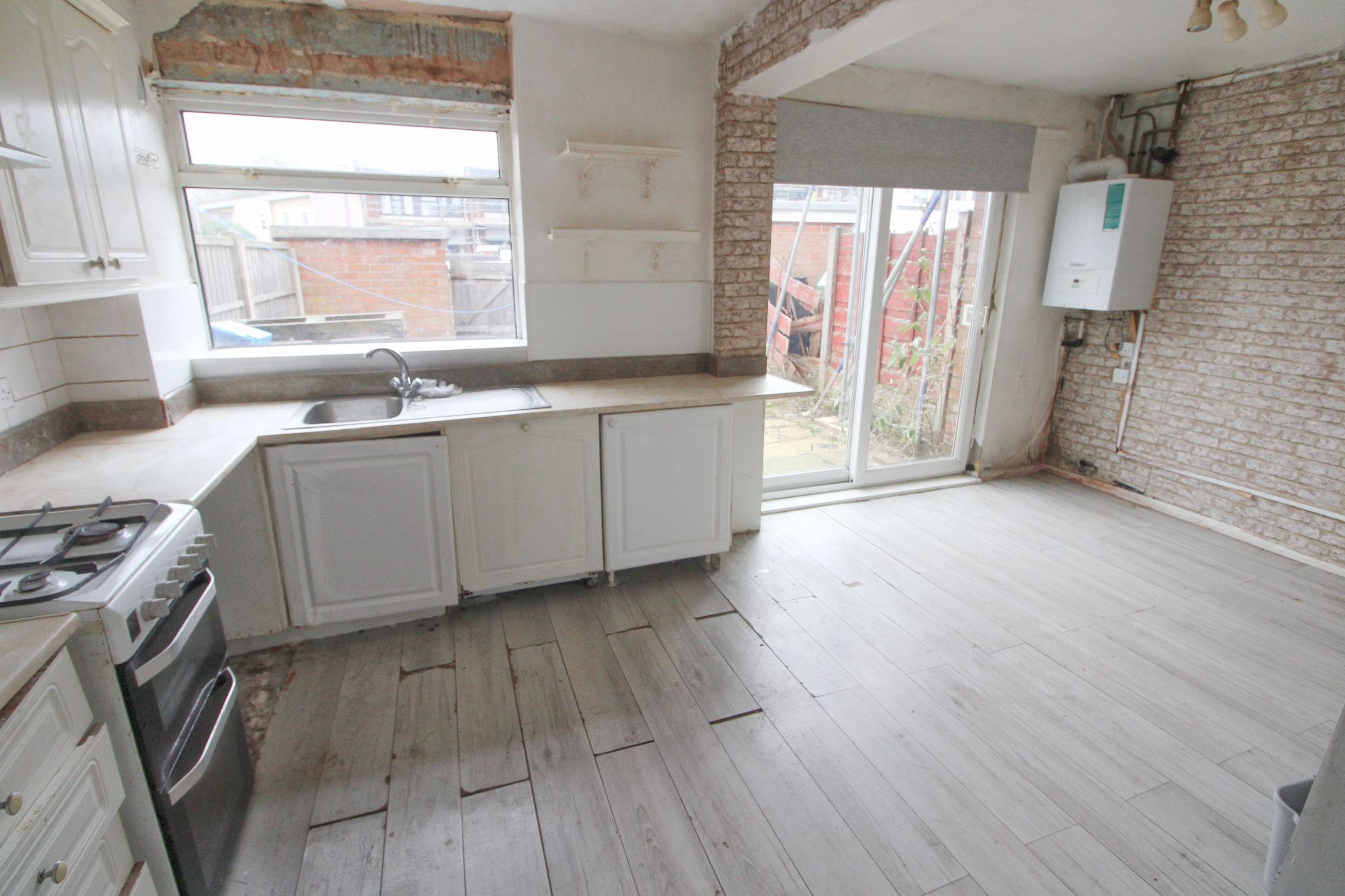 3 bedroom mid terraced house SSTC in Wigan - Photograph 6.